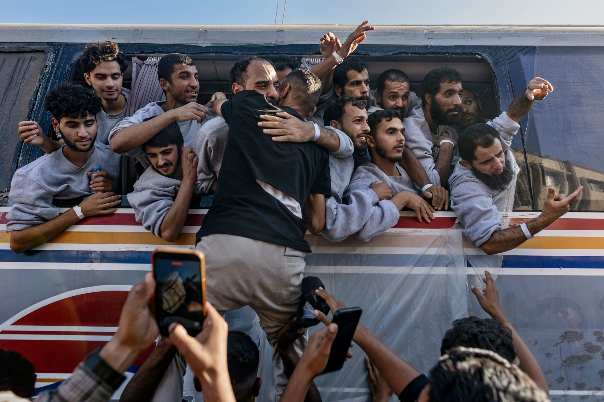 Palestinian detainees and prisoners arrive at Nasser Hospital in Khan Younis, Gaza Strip, after being released from Israeli custody as part of the ceasefire agreement. Israel freed nearly 2,000 Palestinians.