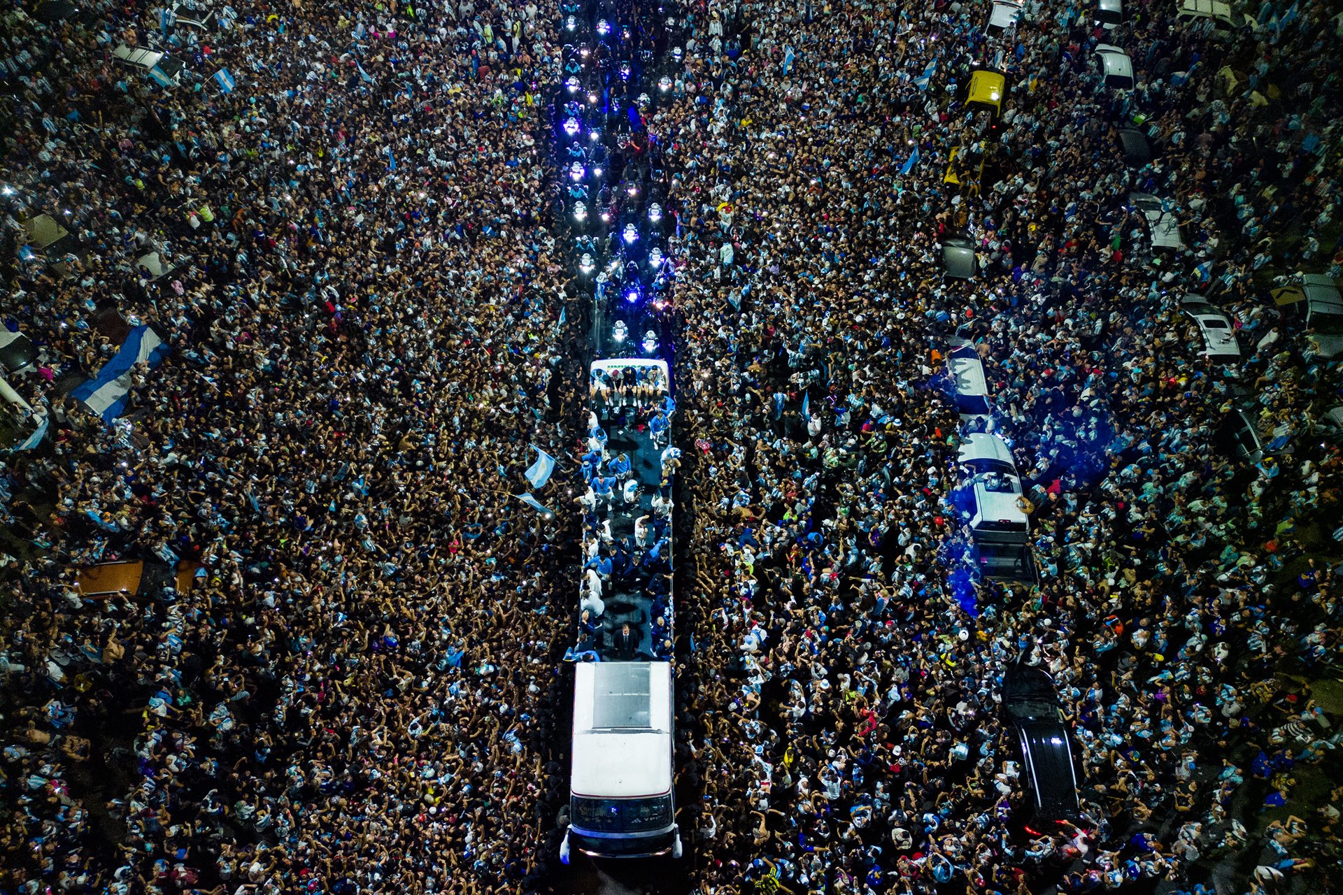 An aerial view of Argentina&rsquo;s players celebrating with their supporters as they leave Ezeiza International Airport en route to the Argentine Football Association training center. An estimated five million fans came out to participate in the victory parade.