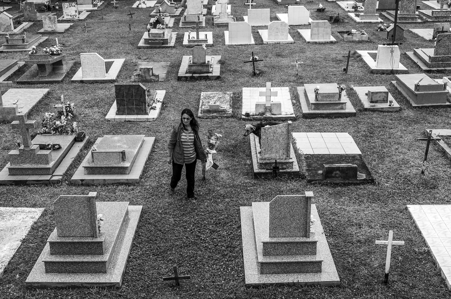 Mirta María Velzi visits the grave of her daughter, who died from a brain tumor at age 17, in Entre Ríos, Argentina. Her father worked for years on farms exposed to multiple chemical substances.&nbsp;