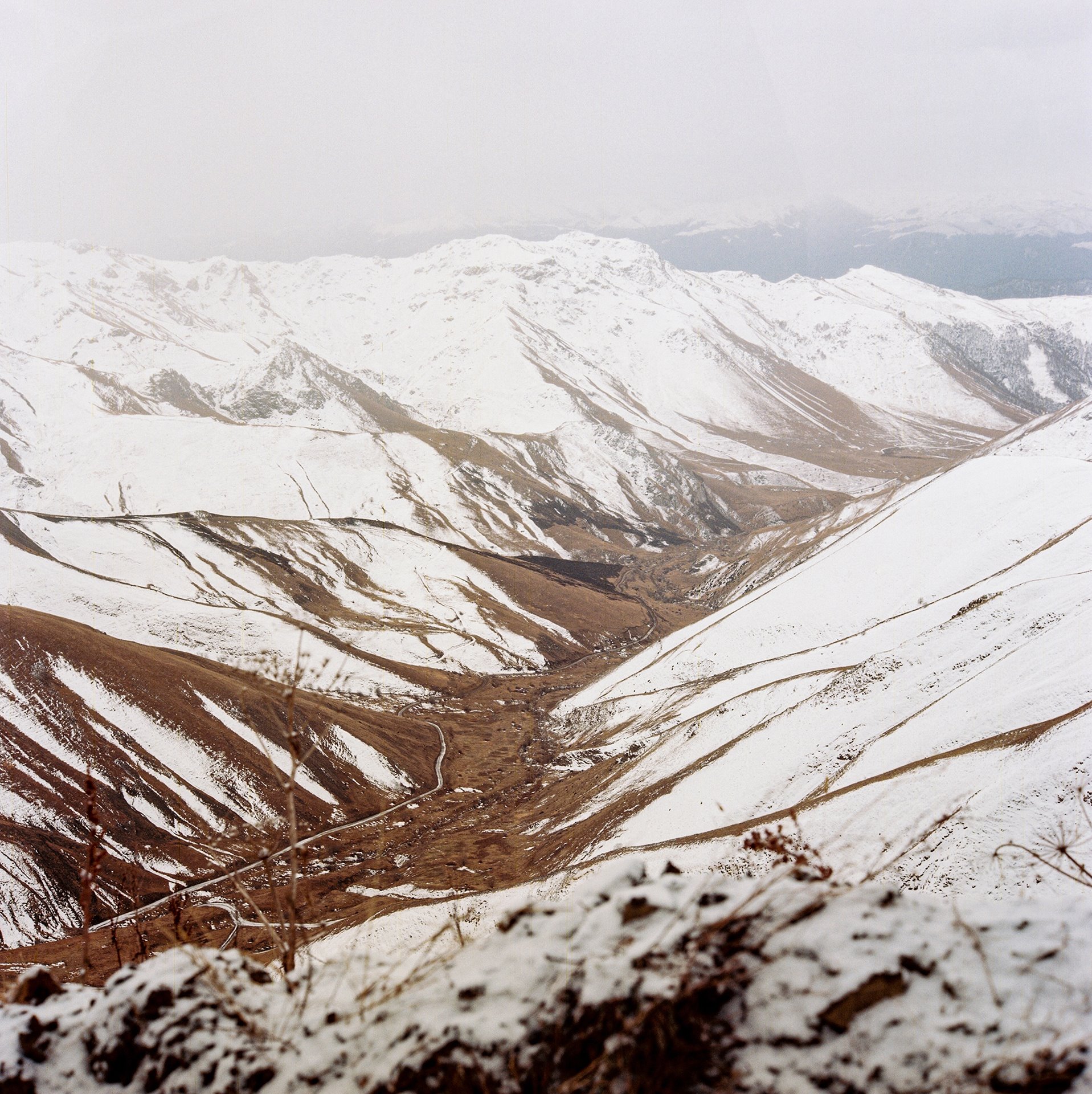 The Murovdağ mountains, where Rustam Effendi hunted butterflies. This road is a mountain pass that leads to Kalbajar, Azerbaijan, a province occupied by Armenian forces in 1993 during the First Nagorno-Karabakh War. Thousands of Azerbaijani refugees fled the conflict through this pass on foot and many died along the way. In November 2020, the province was returned to Azerbaijan but the pass remains riddled with landmines.