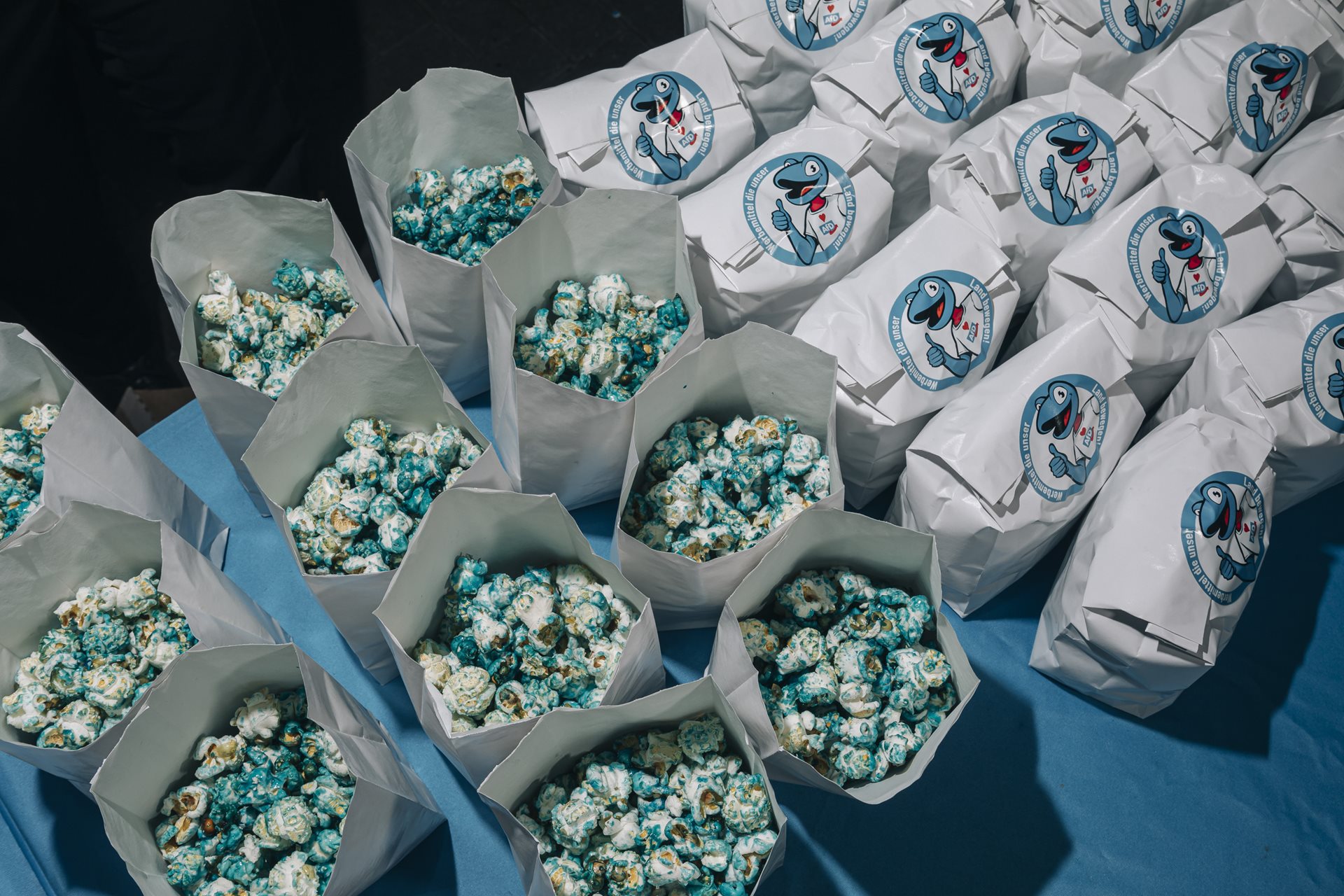 Blue popcorn is stacked ready to be given away to delegates at a party conference, in Magdeburg, Germany. Blue is one of the AfD&rsquo;s party colors.