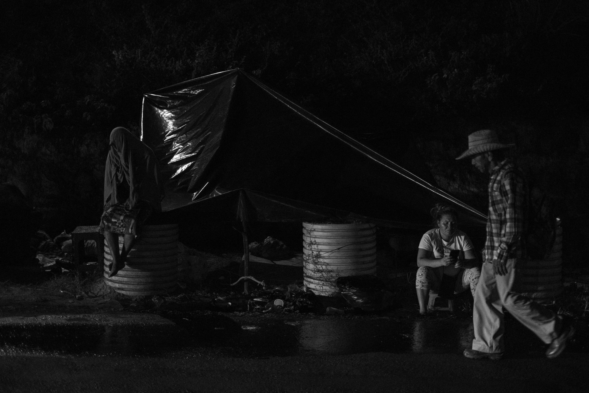 Dozens of people wait outside Mariona jail all night to find out more information about their arrested family members in the early days of the &ldquo;state of emergency.&rdquo; San Salvador, El Salvador.