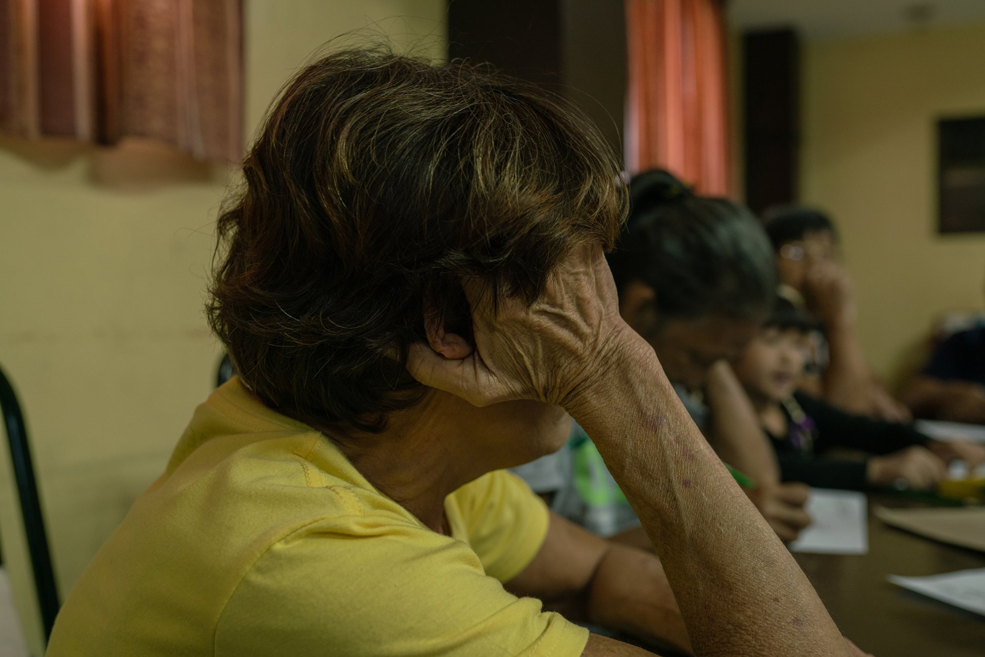 Lorna Reyes attends grief counseling for war-on-drugs victims in Manila, the Philippines. Her two sons, Manuel and Ryan, have been missing since February 2019, when they were abducted by people driving a white van.