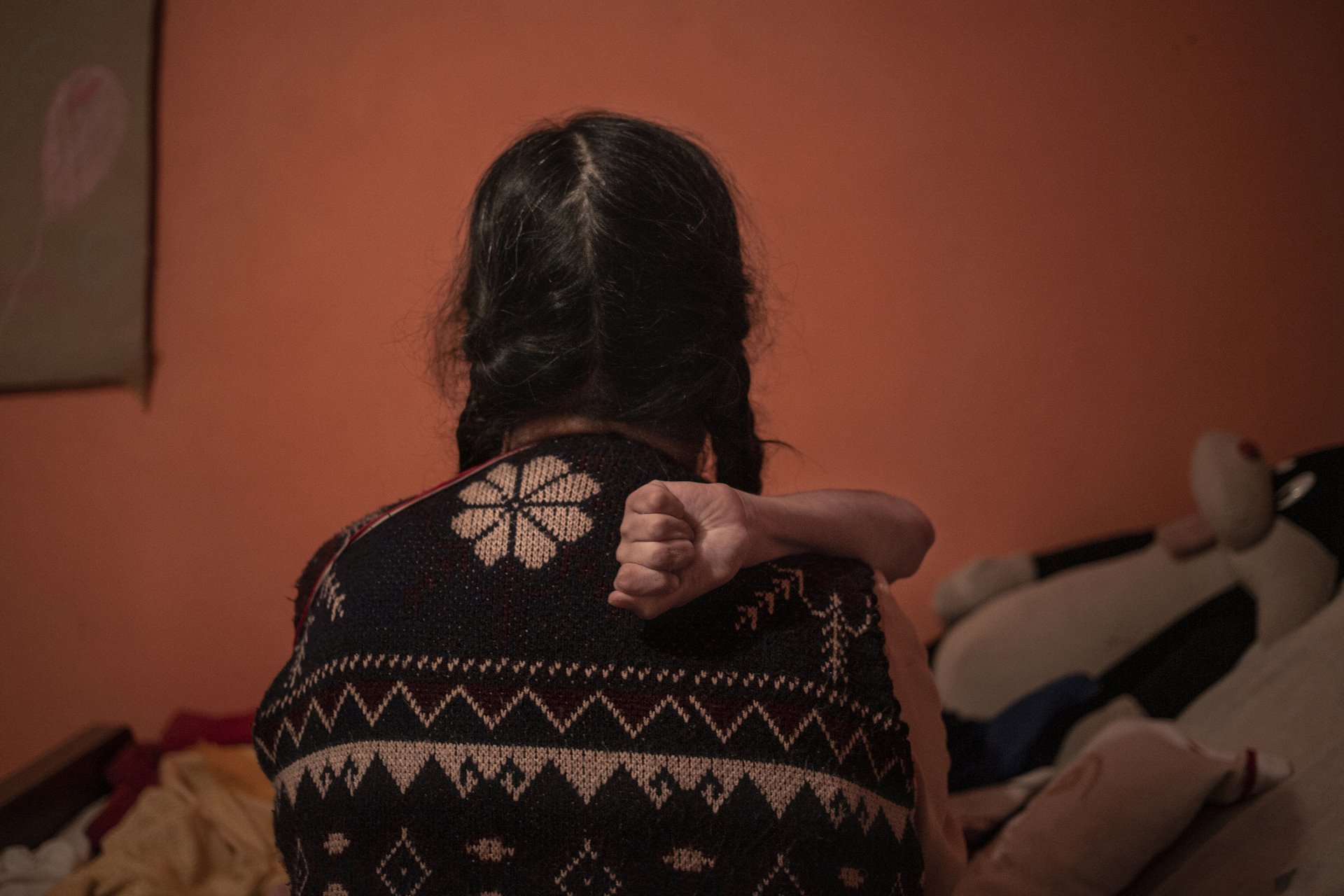 <p>Sebastián (18), who was born with hydrocephalus (a neurological disorder caused by a build-up of fluids in cavities within the brain), holds onto his mother, Doña Petra, after she has bathed him, in Villa Guerrero, Mexico. Doña Petra died of kidney failure during the pandemic, when hospitals were only admitting COVID-19 patients.</p>
