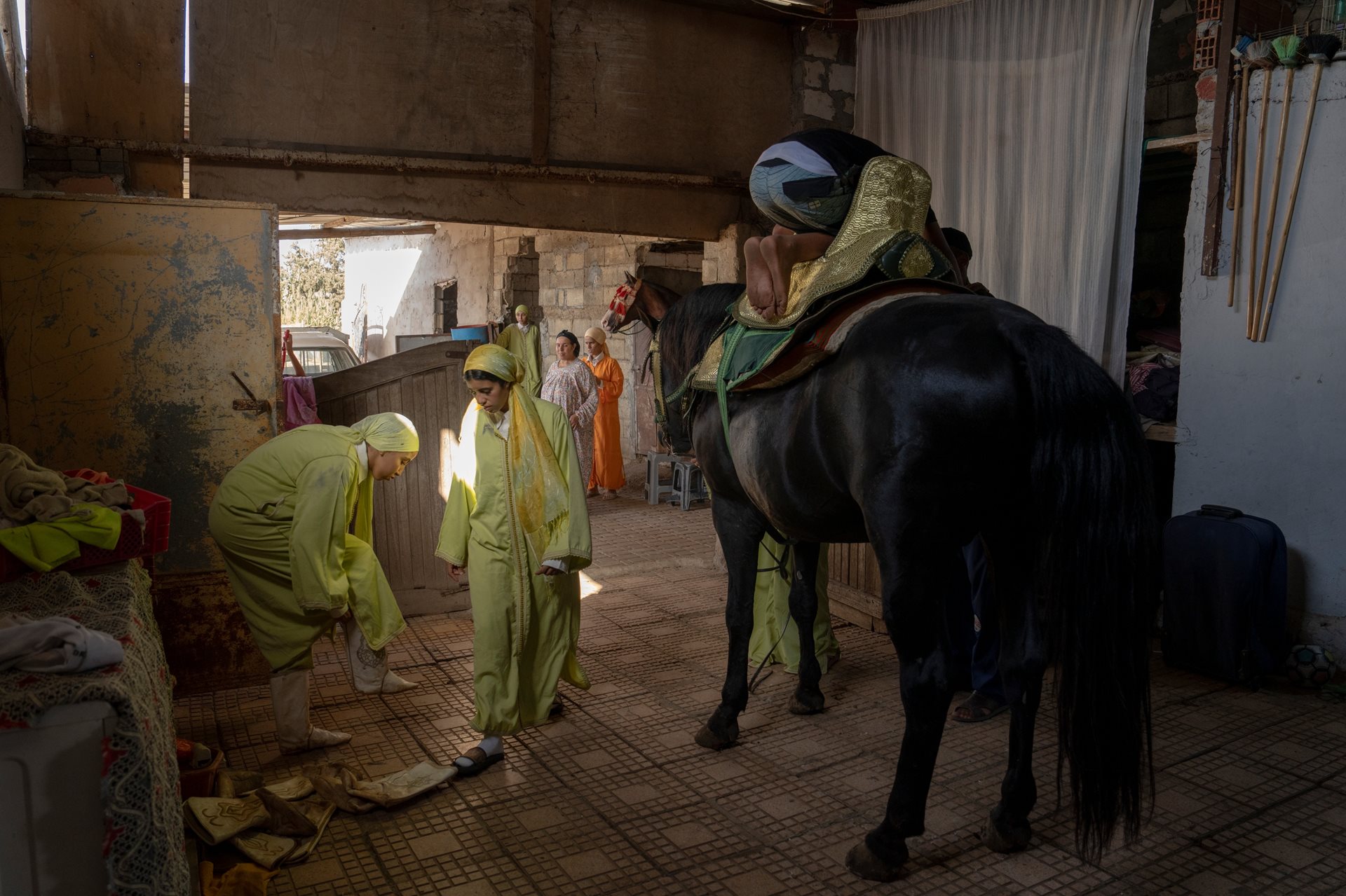 In the Nabata family&rsquo;s stable in Rabat, Morocco, riders dress and saddle their horses. The deep bond between rider and horse is central to Tbourida, nurtured through year-round care and training.