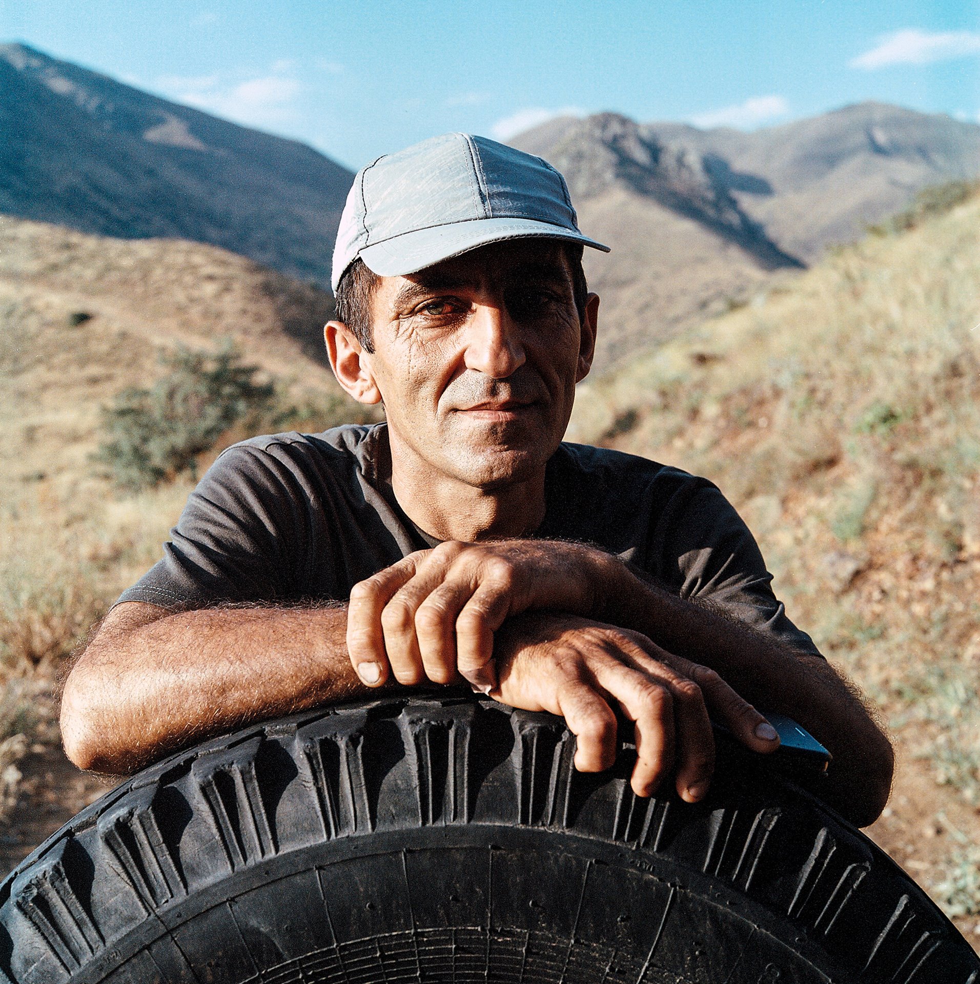 Goga, driver of the Soviet era all terrain vehicle that transported Parke Kazarian and the photographer into the mountains in search of Satyrus effendi, a rare butterfly native to the region named after the photographer&rsquo;s father. Despite searching for a week, they did not find the butterfly. Yeghegnadzor, Armenia.