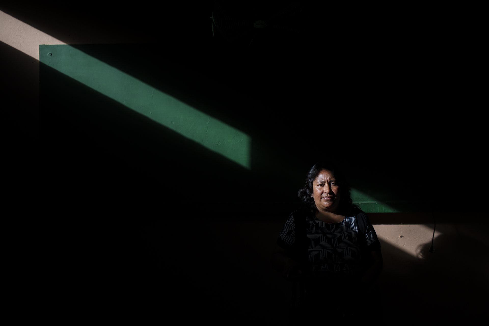 Nora Nancy, a teacher, photographed at her school in Samaniego, Colombia. In 2008, four teachers were murdered by FARC rebel forces in nearby Guachavés, forcing her to flee her home.