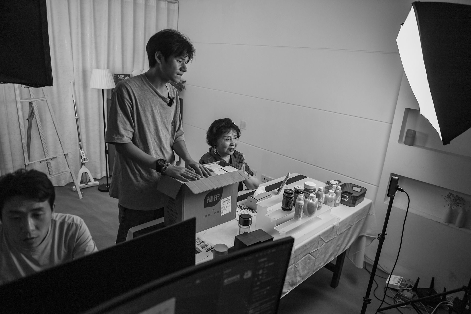 Now 73, Sheng Hailin performs a live-stream to sell products on China&rsquo;s online short-video platforms. With nearly a million followers, she pivoted to digital sales to continue funding her daughters' future from home. Hefei, Anhui Province, China.