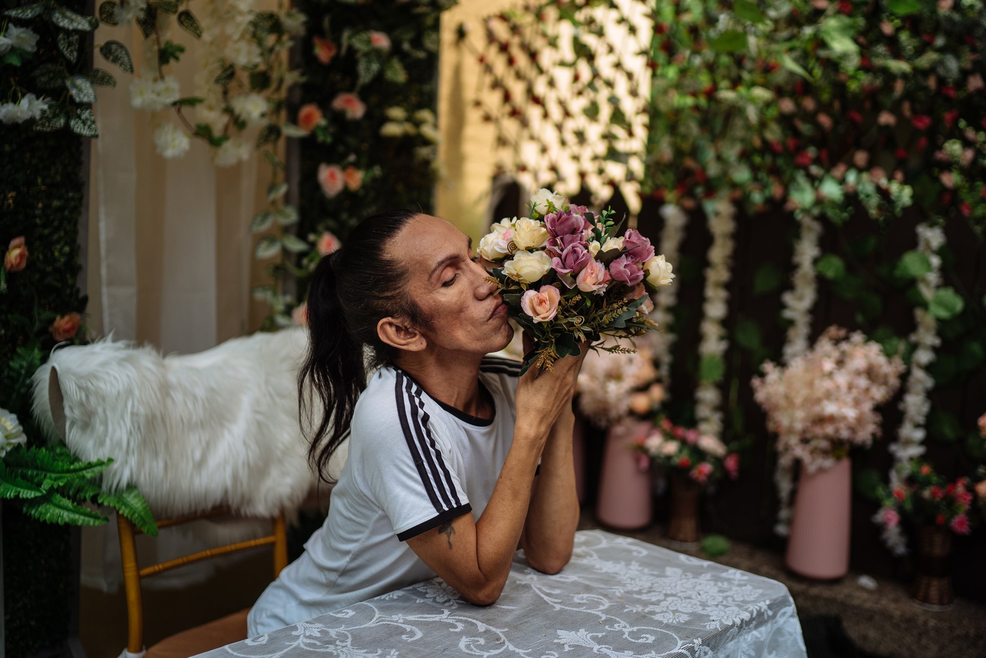 <p>Odessa Jones (55), back home from a film audition, poses with flowers in Manila, the Philippines.</p>
