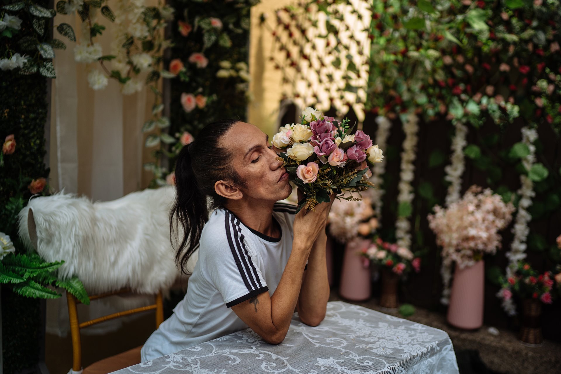 <p>Odessa Jones (55), back home from a film audition, poses with flowers in Manila, the Philippines.</p>
