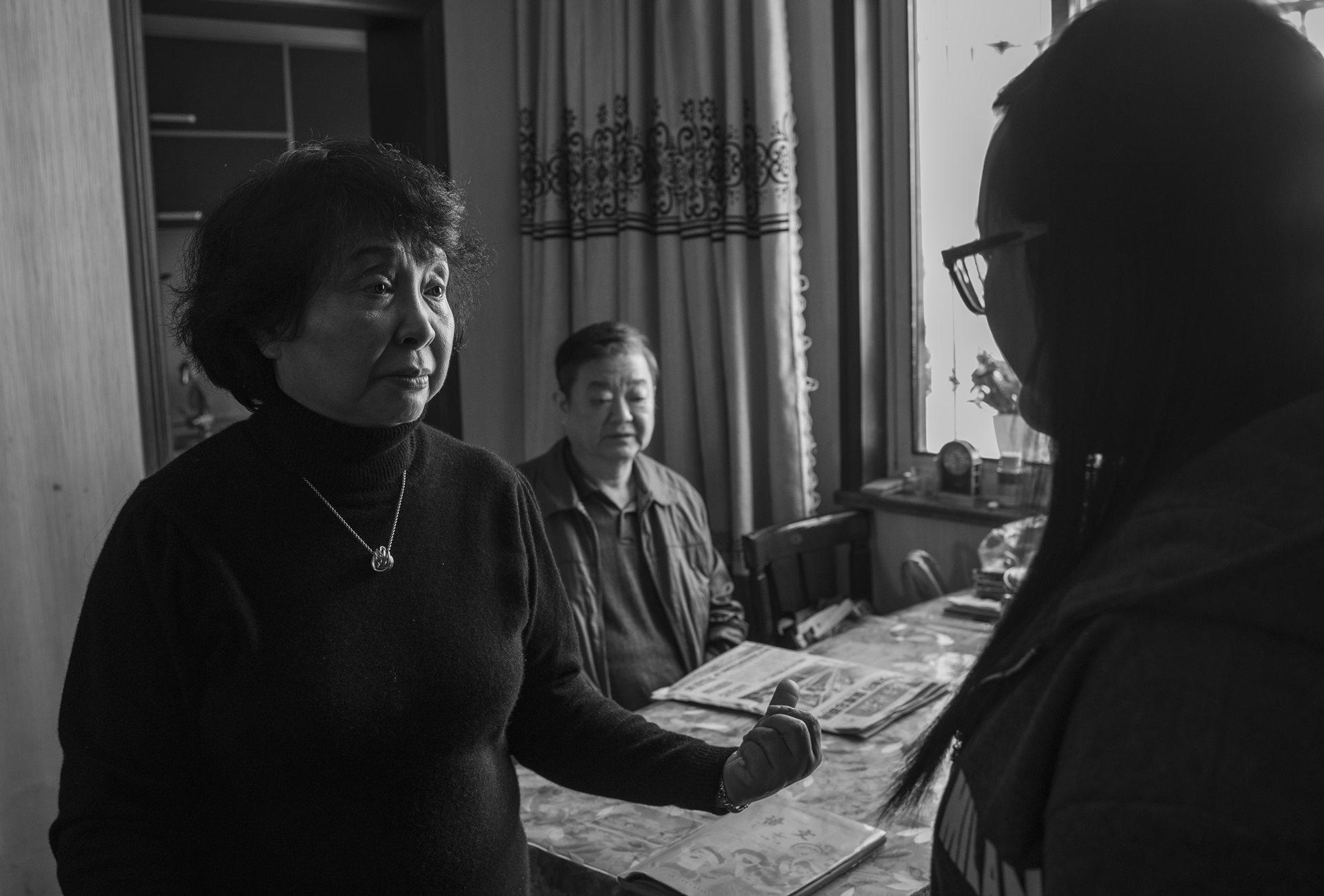 Sheng Hailin consults with a private tutor. Following her husband&rsquo;s stroke in early 2016, Sheng Hailin became the sole manager of the household's complex educational and medical needs. Hefei, Anhui Province, China.
