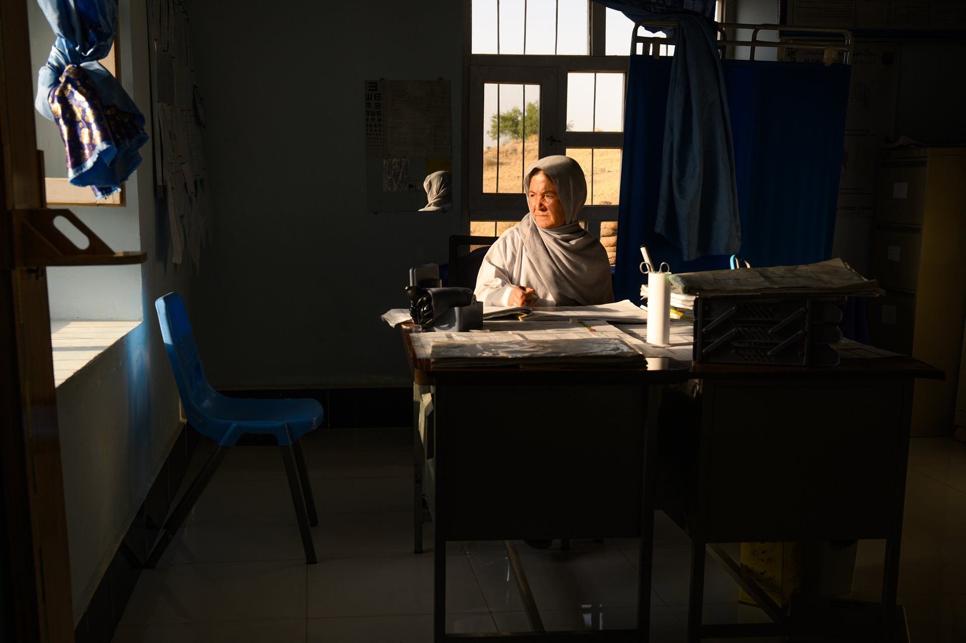 &ldquo;I cannot abandon the women of my community,&rdquo; says Gulshaman, at her desk in the clinic she runs alone. Waras, Shahristan district,&nbsp;Daikundi province, Afghanistan.