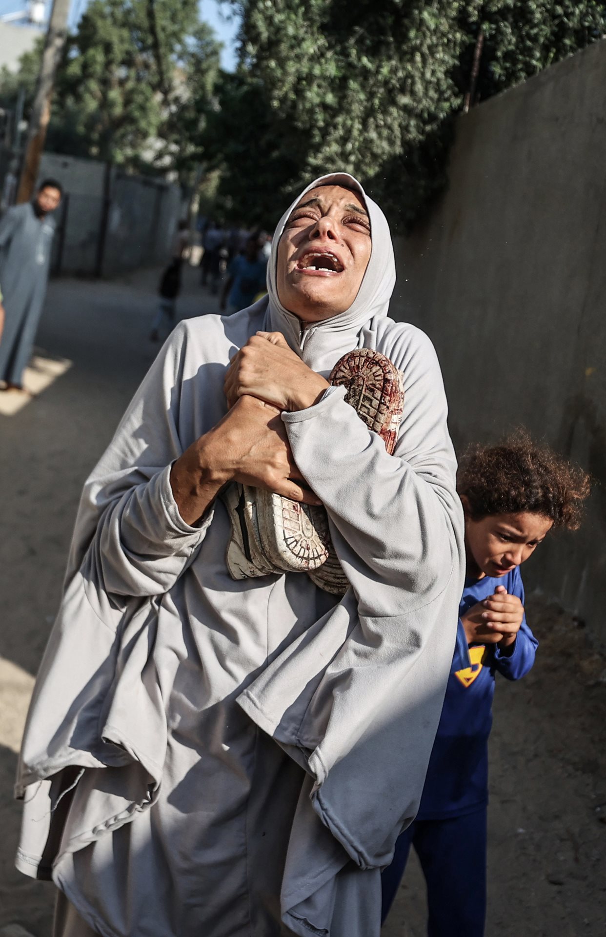 A woman in Gaza City, Gaza, mourns the death of her husband, killed during Israeli attacks on the Nuseirat IDP camp in central Gaza.