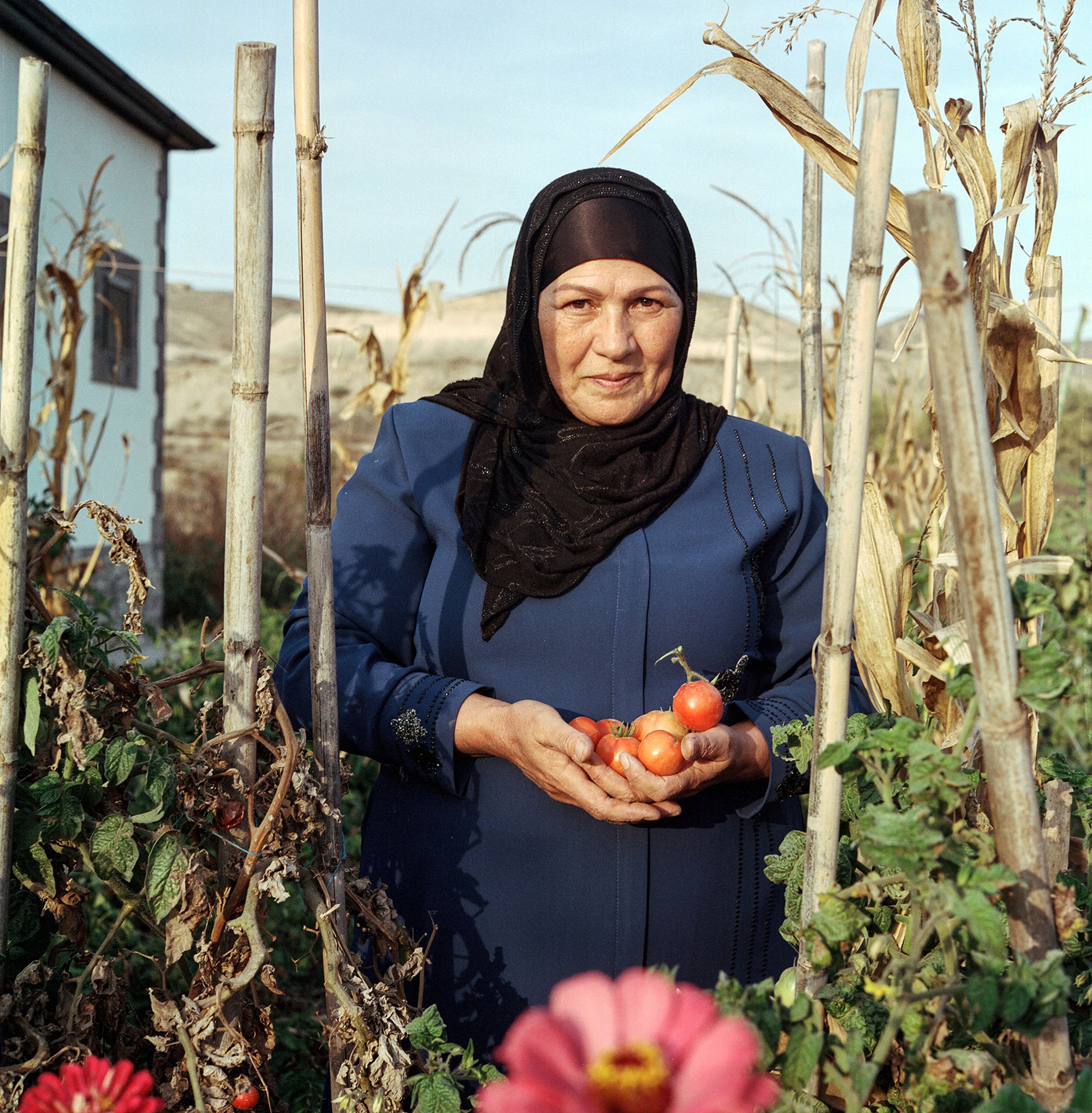 Firengiz Salimova in her village of Agali in the district of Zangilan, Azerbaijan. Internally displaced during the First Nagorno-Karabakh War in 1993, Salimova returned to Agali after it was reclaimed by Azerbaijan in 2020.