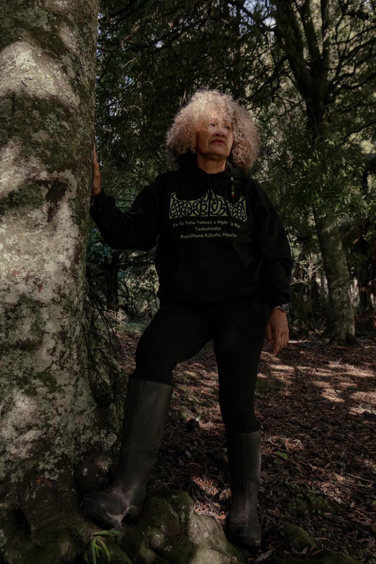 Meriana Taputu (65), a life coach and cultural advocate, poses for a portrait in Ruatāhuna, New Zealand, while on one of her frequent visits to Te Urewera to see family and reconnect with roots. She focuses on empowering women from Māori communities navigating the impacts of colonization.