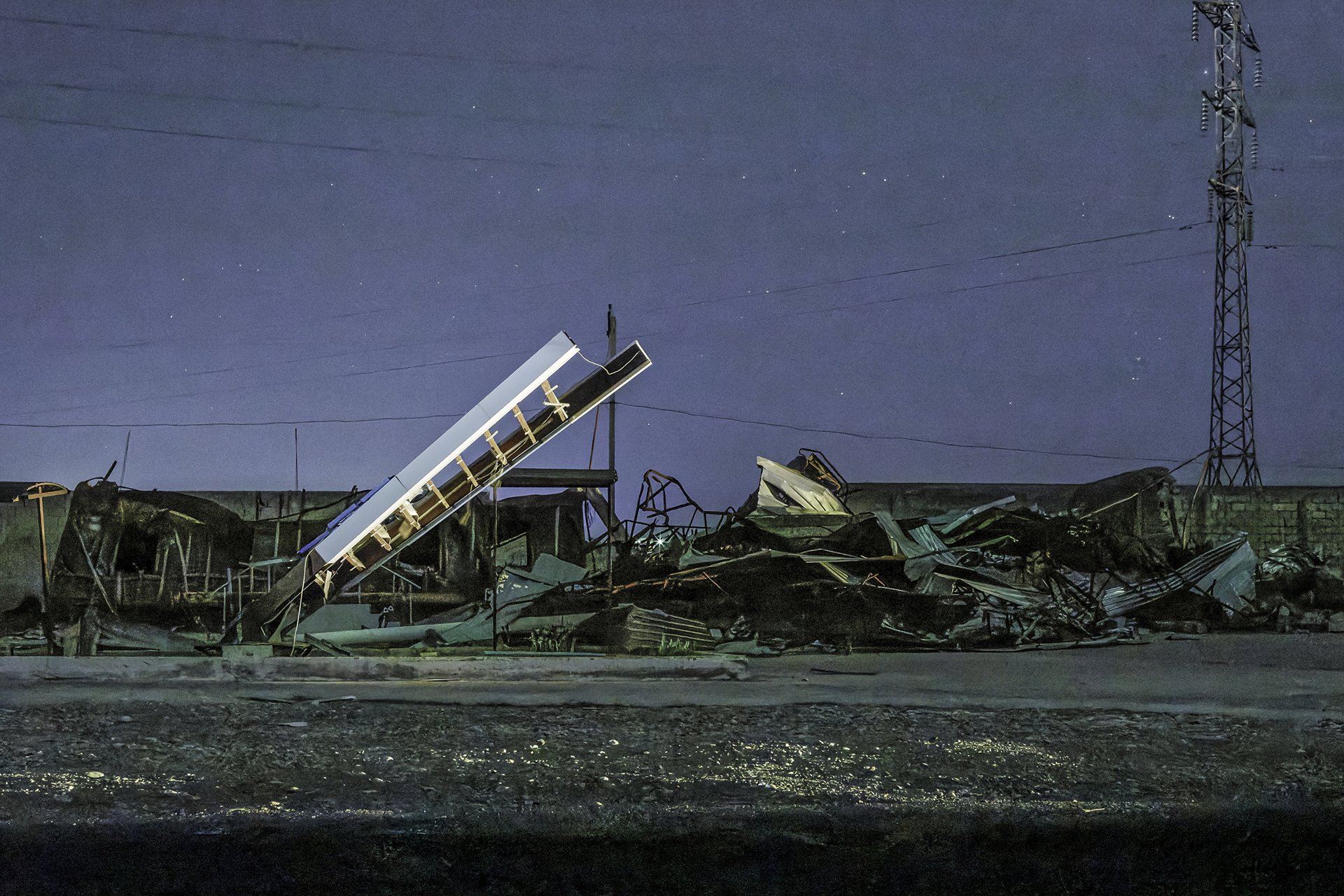 <p>Buildings lie in ruins on the Kyrgyzstan side of the Kyrgyzstan-Tajikistan border. Disagreements over a water distribution source had turned into cross-border violence some weeks earlier.</p>
