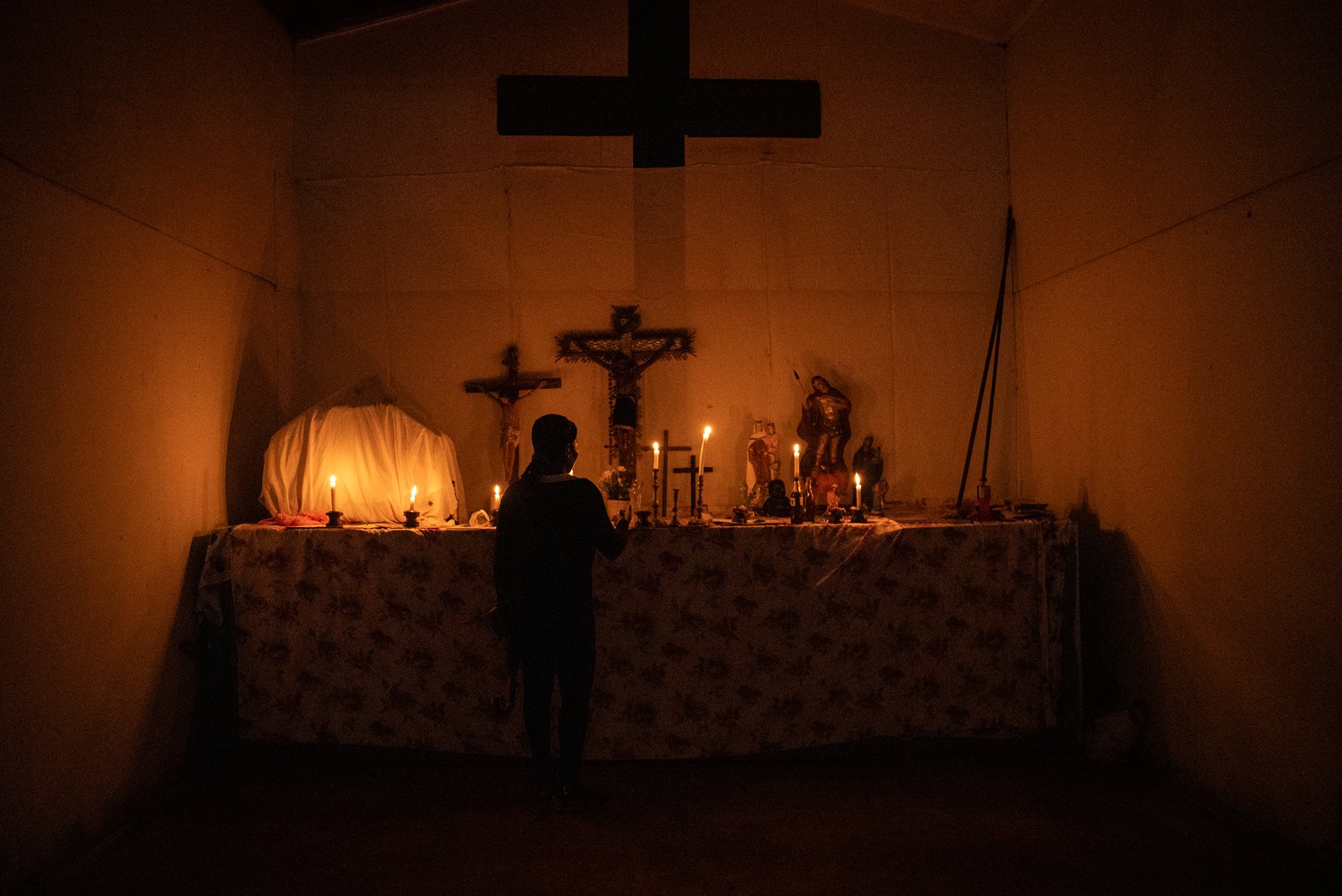 Community members gather for a ritual imposed during the colonial era. Over centuries, the community of Juntas, Buenaventura, Colombia have reclaimed the celebration as Fiesta de los Manacillos, blending imposed Catholicism with African spiritual practices to create a unique cultural identity.