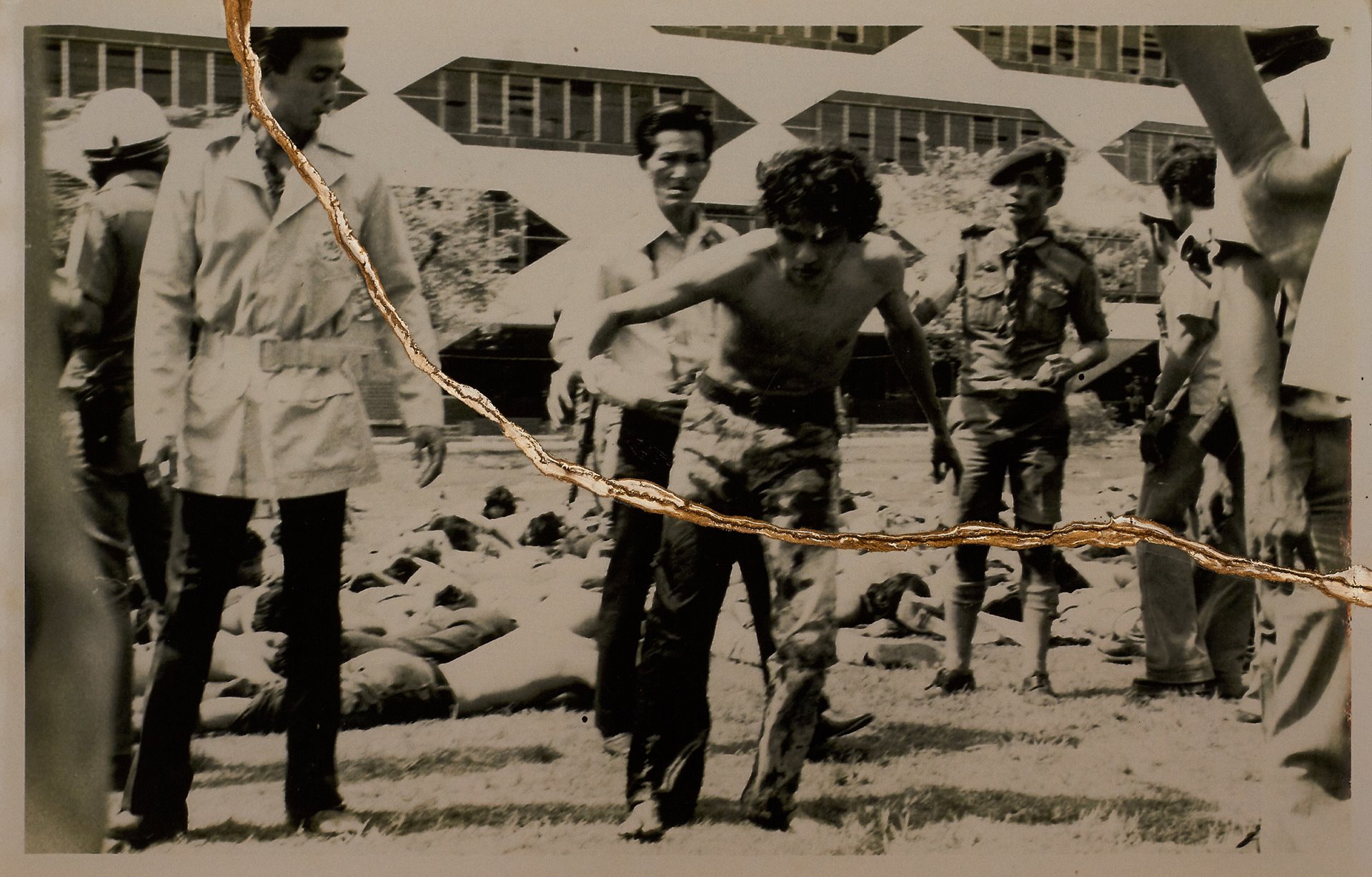 A protester is surrounded by government forces and bodies, both dead and alive, at Thammasat University, Bangkok, Thailand.&nbsp;<br />
<br />
Due to the strict control of the military government, the massacre is not mentioned in classrooms or textbooks. The golden scar formed by <em>kinstugi</em> illustrates the resilience to the suppression of knowledge and symbolises the act of transforming hope through trauma.