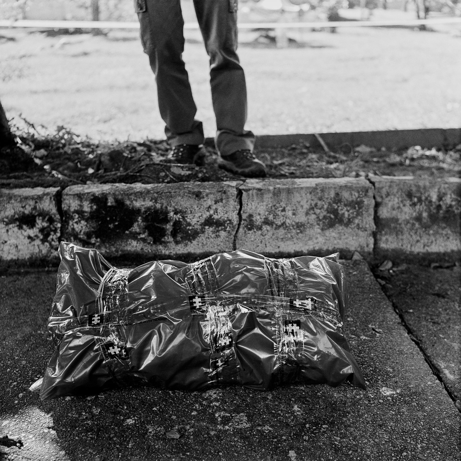 The remains of a body exhumed in the Jardín Cementerio Universal during a search for victims of Operación Orion &ndash; a military action against Medellín urban guerillas in 2002 &ndash; lie ready to be transported to a forensic laboratory to be identified. The bodies of a number of people killed in the operation were buried, unregistered, in mass graves in the cemetery. After two weeks of excavations, a team of forensics found two of the nine bodies they were looking for.