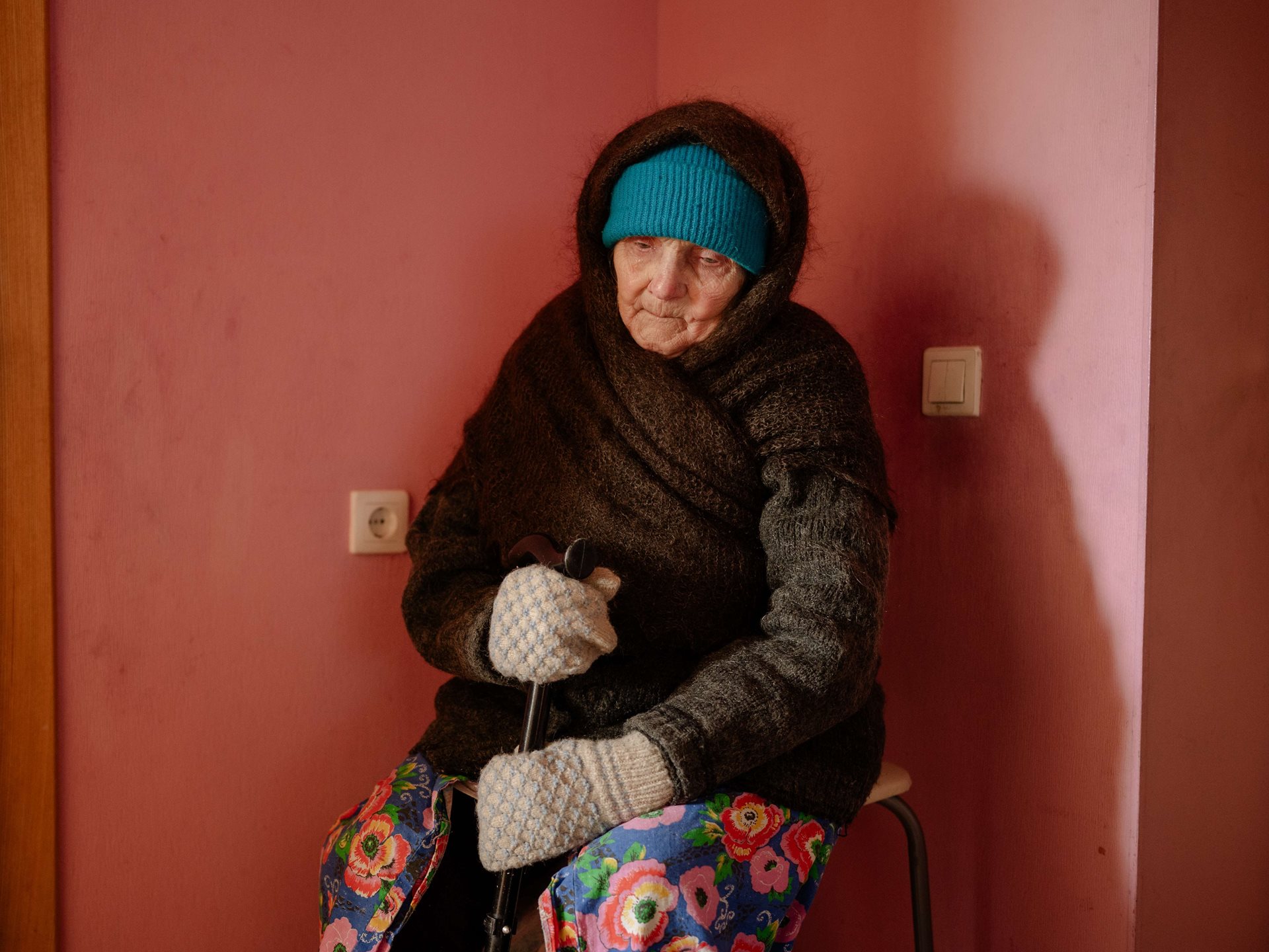 Aliona&rsquo;s grandmother rests after a walk, in Tomsk, Russia. She never leaves the house alone, too afraid of falling or getting lost. Grandma gifted Aliona her warm, downy shawl, a gospel, and Aliona&rsquo;s old baby towel to take back to Germany.&nbsp;