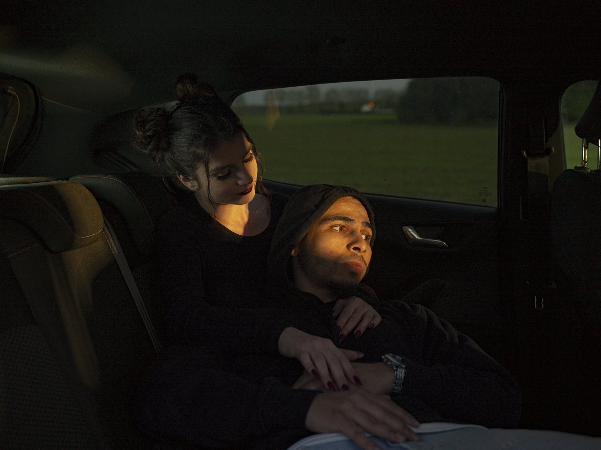 <p>Younes and Sandra embrace in a car close to Villepinte. Seine-Saint-Denis, France, 18 April 2024</p>
<br />
&nbsp;