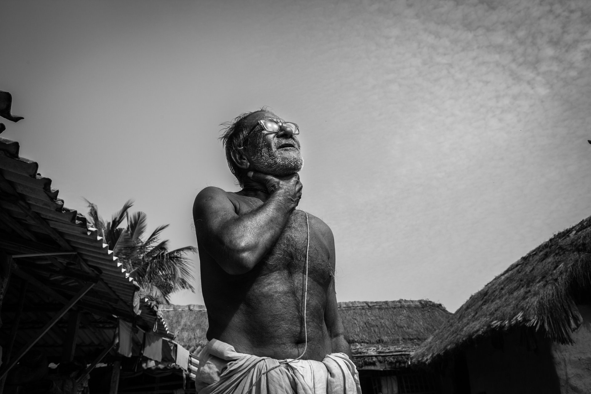 <p>Bhuthari, a fisherman, explains how he was attacked by a tiger while collecting crabs, in the forest buffer zone around the Sundarban Tiger Reserve, in a delta region of West Bengal, India.</p>
