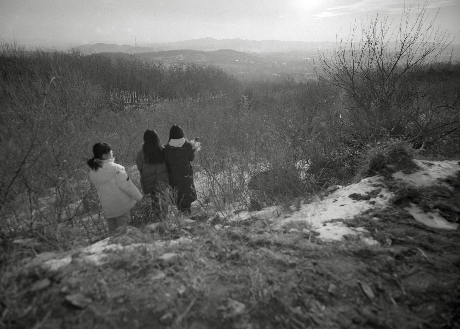 Days before the first Spring Festival since Jiuer has passed away, the children are on the way to the cemetery. Jiuer once said: &ldquo;Rough times will pass, as long as you know how to let things go. Kids, you need to learn to appreciate the beauty in your life journey.&quot; Liaoning, China.