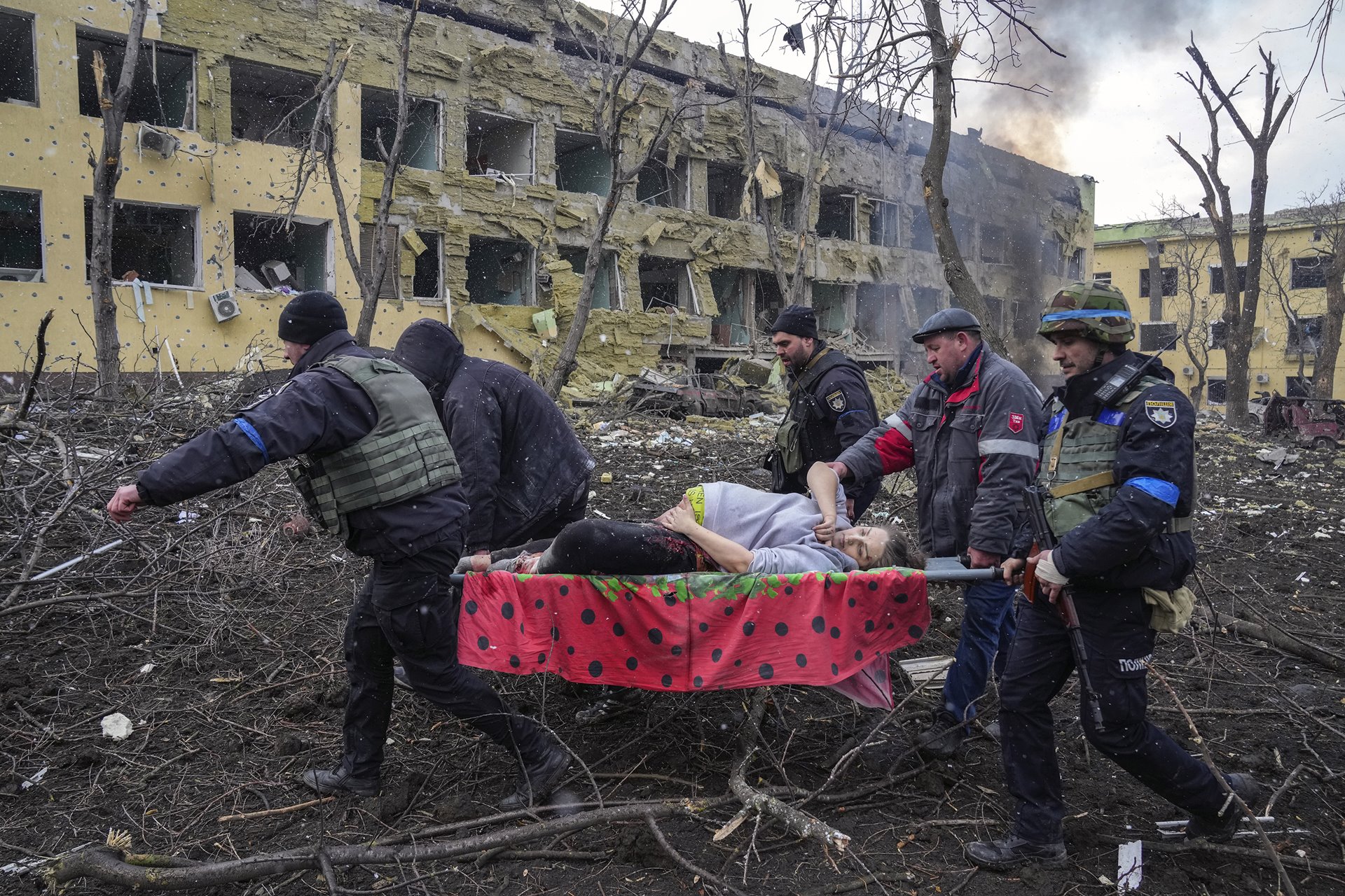 Iryna Kalinina (32), an injured pregnant woman, is carried from a maternity hospital that was damaged during a Russian airstrike in Mariupol, Ukraine. Her baby, named Miron (after the word for &lsquo;peace&rsquo;) was stillborn, and half an hour later Iryna died as well.