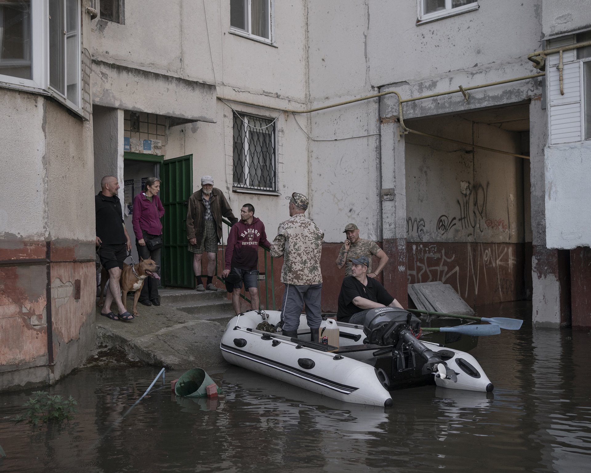 Viktor and his volunteer team evacuate Valentina and her dog Boss from Korabel, an island that forms part of the city of Kherson, Ukraine, and was the area most affected by the floods.