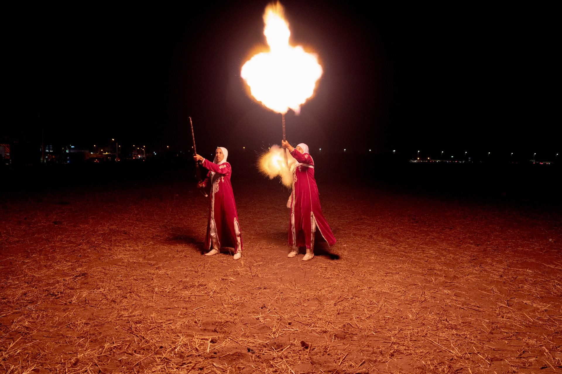 <p dir="ltr">Two riders unload rifles that failed during the performance, a necessary safety measure to ensure no gunpowder remains inside, in Sidi Rahal, Morocco.</p>
