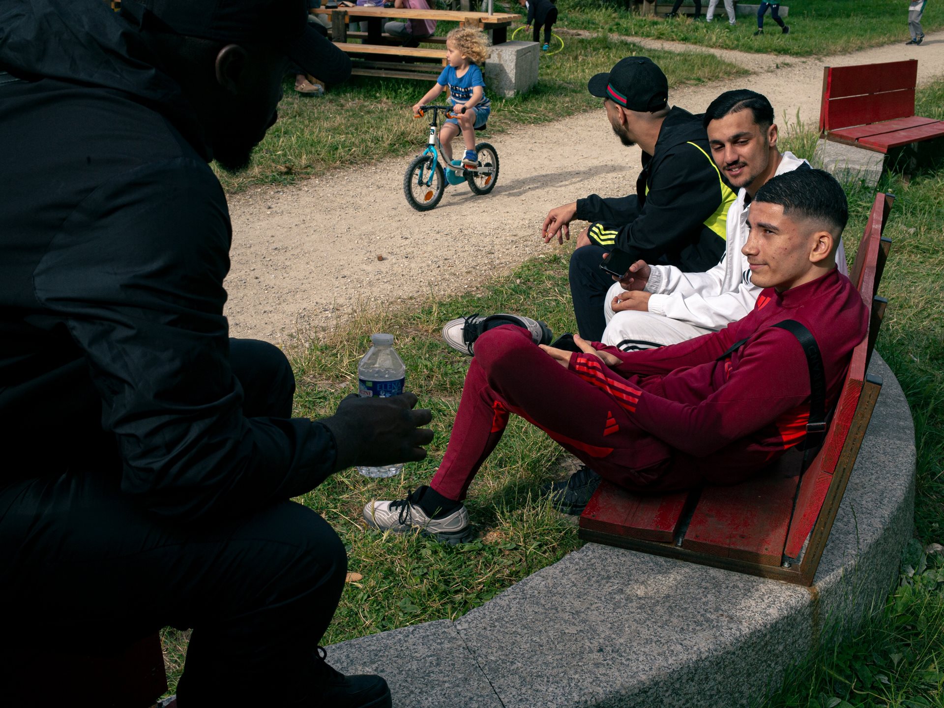 <p>Mehdi, a young boxer of Algerian origin, with friends at the Bosquets housing project in Montfermeil, France.&nbsp;</p>
