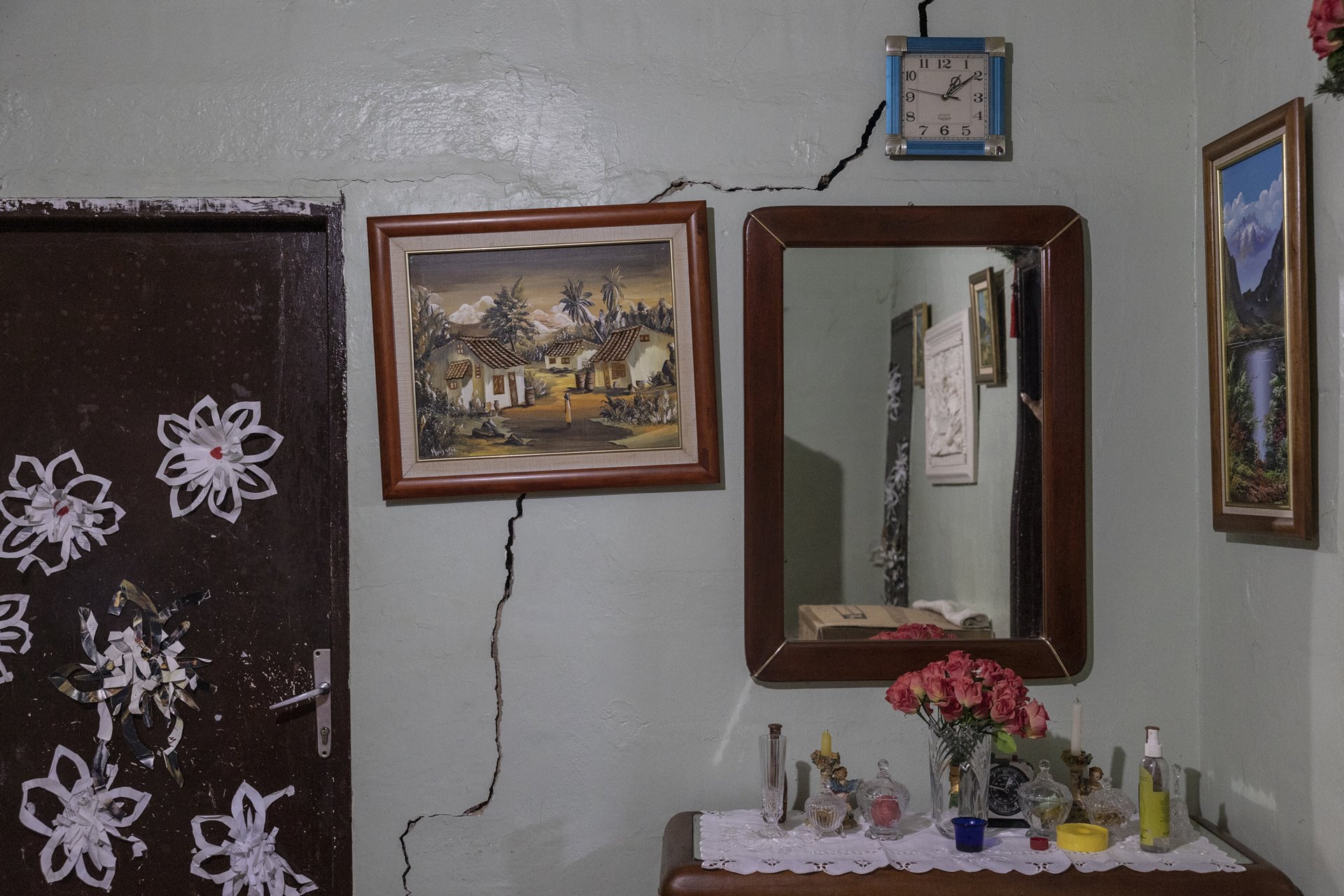 A crack caused by subsidence cuts through a wall in the home of Hilda Davalillo (67), in Campo Alegría, an oil community in Cabimas, Zulia State, Venezuela. Hilda was asked to move out due to the high risk of collapse, but she was not given another place to live, so stayed.<br />
<br />
Campo Alegría is one of a number of settlements built specifically for workers with the now-ailing state oil company PDVSA, though these days many residents no longer work for the company. Once seen as a symbol of the rising Venezuelan middle class, many such neighborhoods are now falling apart due to subsidence caused by oil drilling, and residents experience lack of basic services.