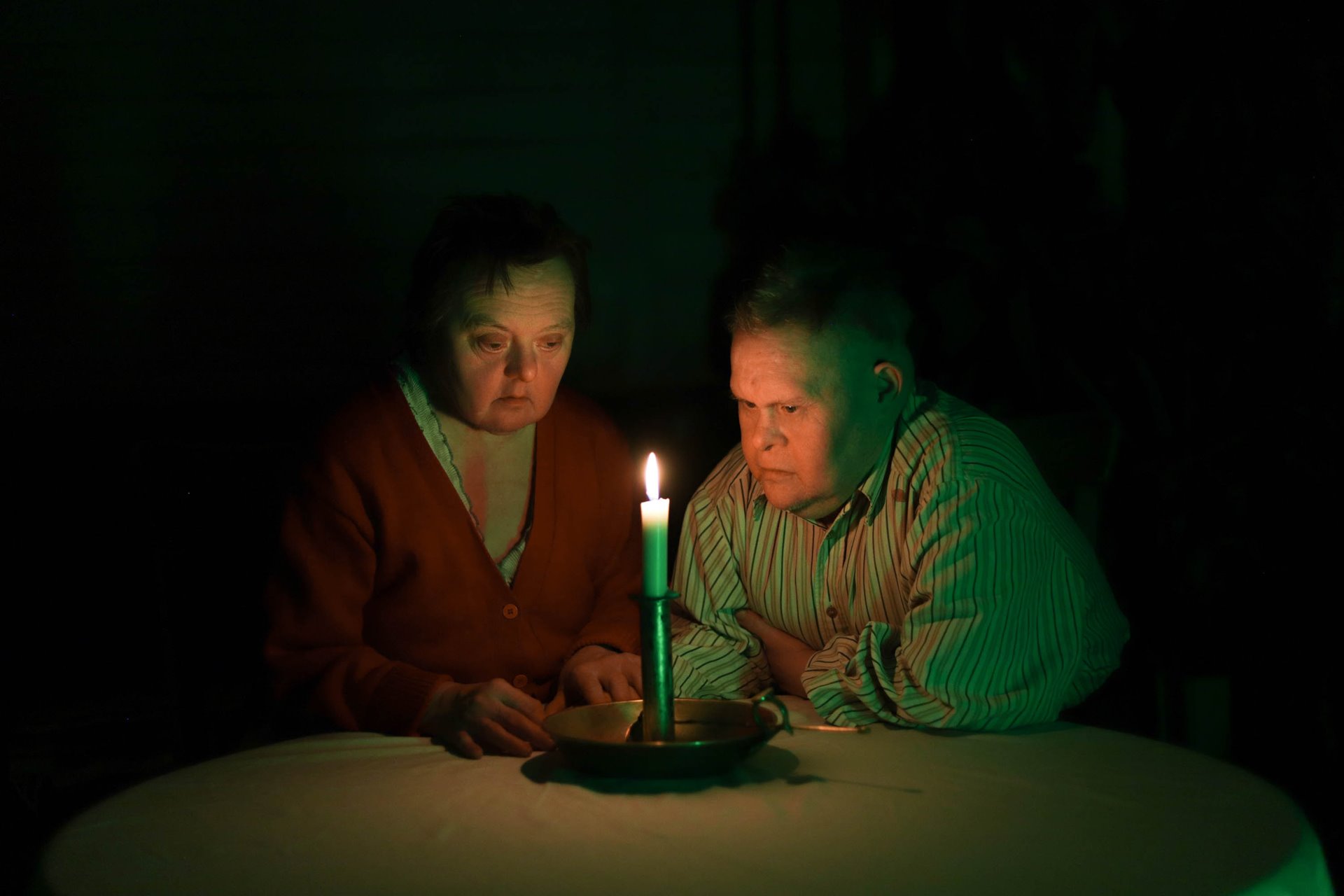 Minya and Tatyana sit together after Bible study. Svetlana residents get dressed up and spend time together every Saturday, discussing a chapter from the Bible and sharing their impressions of the week.