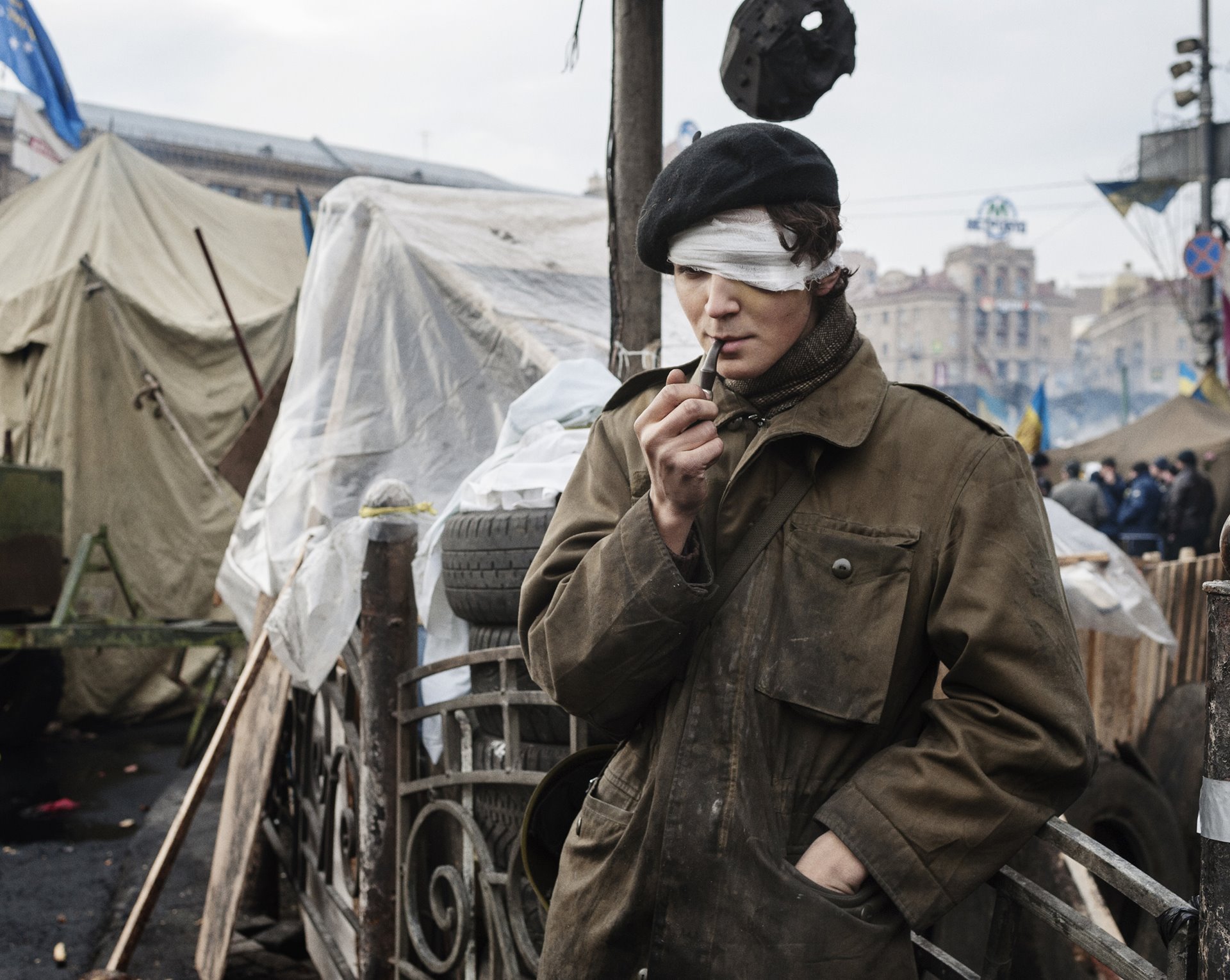 A man stands on the Maidan, the central square in the Ukraine capital, Kyiv, after clashes between anti-government protesters and security forces, which had resulted in more than 100 deaths (including 13 police officers) and around 2,000 injured.