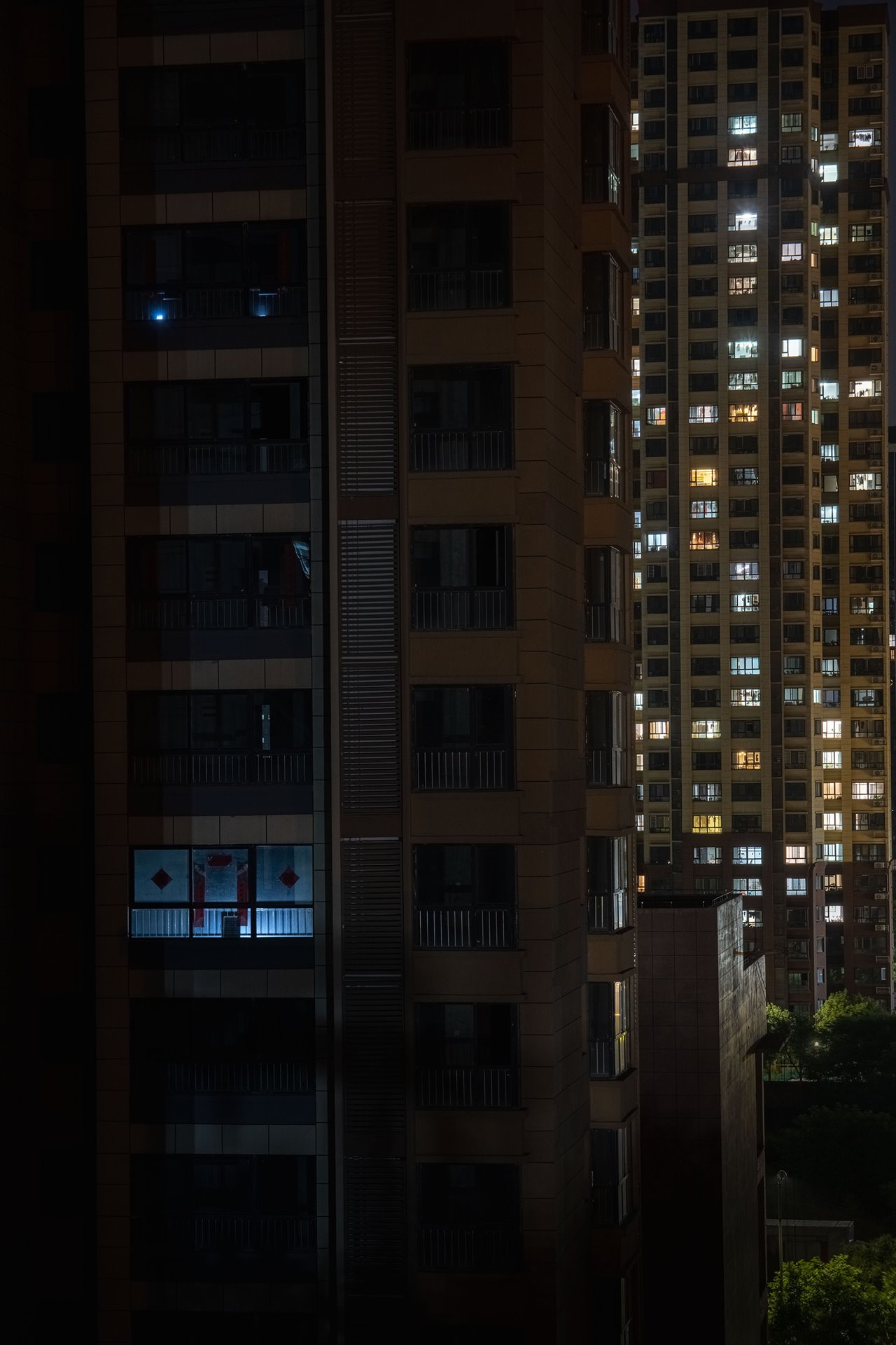 <p>A solar powered light illuminates an unfinished apartment in the city of Xi&rsquo;an, China. By some estimates, as many as 5 percent&nbsp;of new residential developments in major Chinese cities have not been completed, affecting hundreds of thousands of homeowners.</p>
