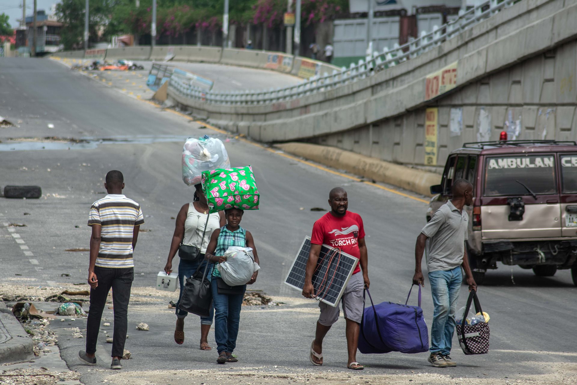 Residents flee gang violence in their neighborhood in Port-au-Prince, Haiti. According to the United Nations, thousands of Port-au-Prince residents have been killed and more than a million displaced in 2024.&nbsp;