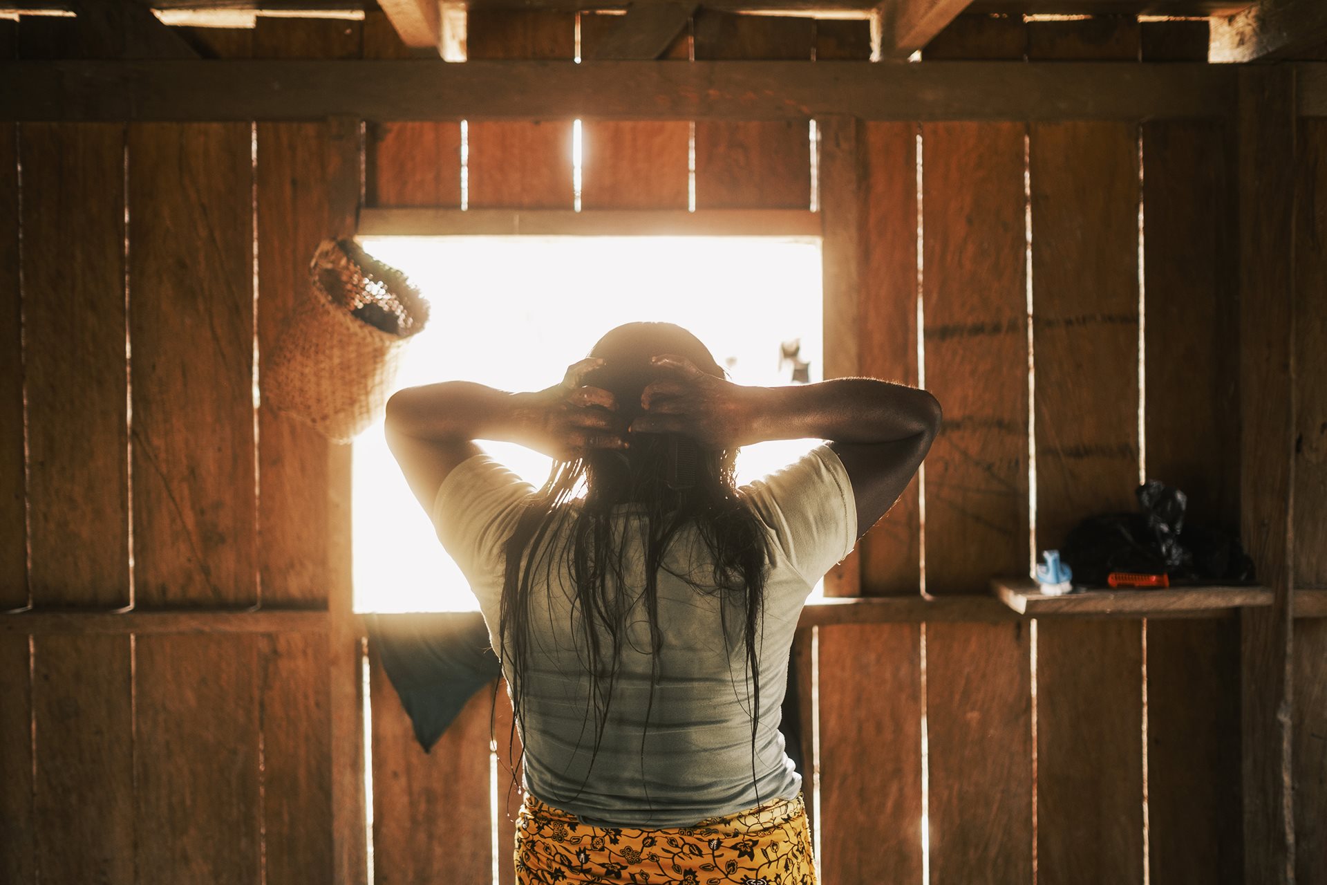 Liria Cheito attempted suicide using her paruma, a traditional garment of her community, on 7 April 2023, after being abused by her husband. Puerto Antioquia, Chocó, Colombia.