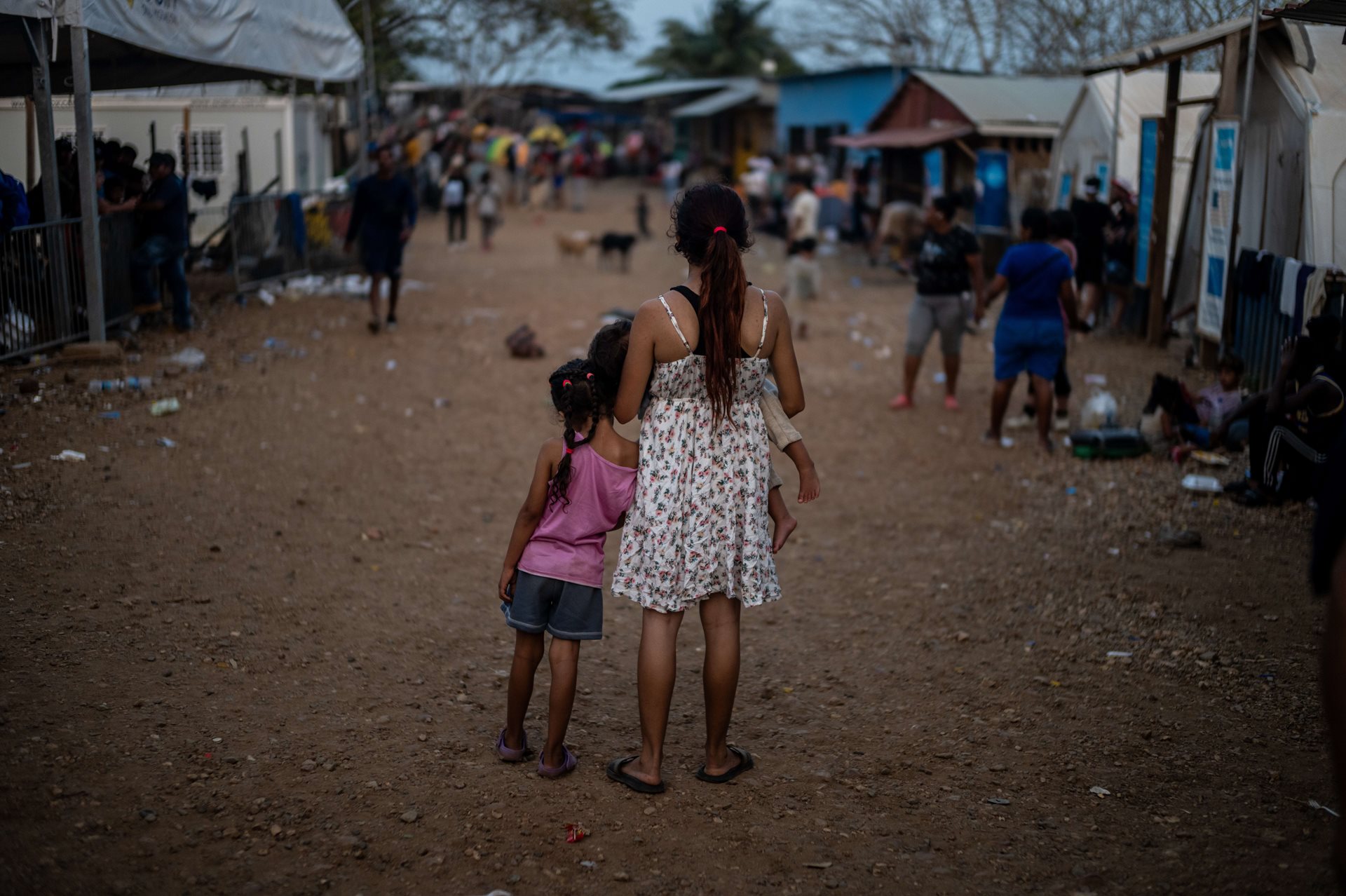 She fled poverty in Venezuela, where she worked in a bakery. Masked men surrounded her group in the jungle, she said, and separated the men from the women. Then the perpetrators &quot;touched us,&quot; she said, &quot;they groped us, they dragged us by the hair, they stole what we had.&rdquo;