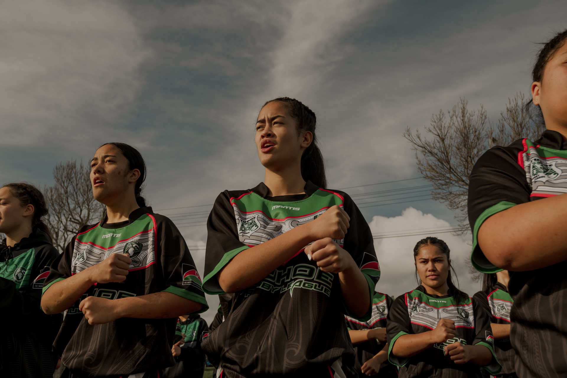 Mihiata Teepa (16) and her Tūhoe Māori Rugby League U16 teammates perform a haka (a traditional dance and chant of challenge) during practice before a game, in Rotorua, New Zealand.