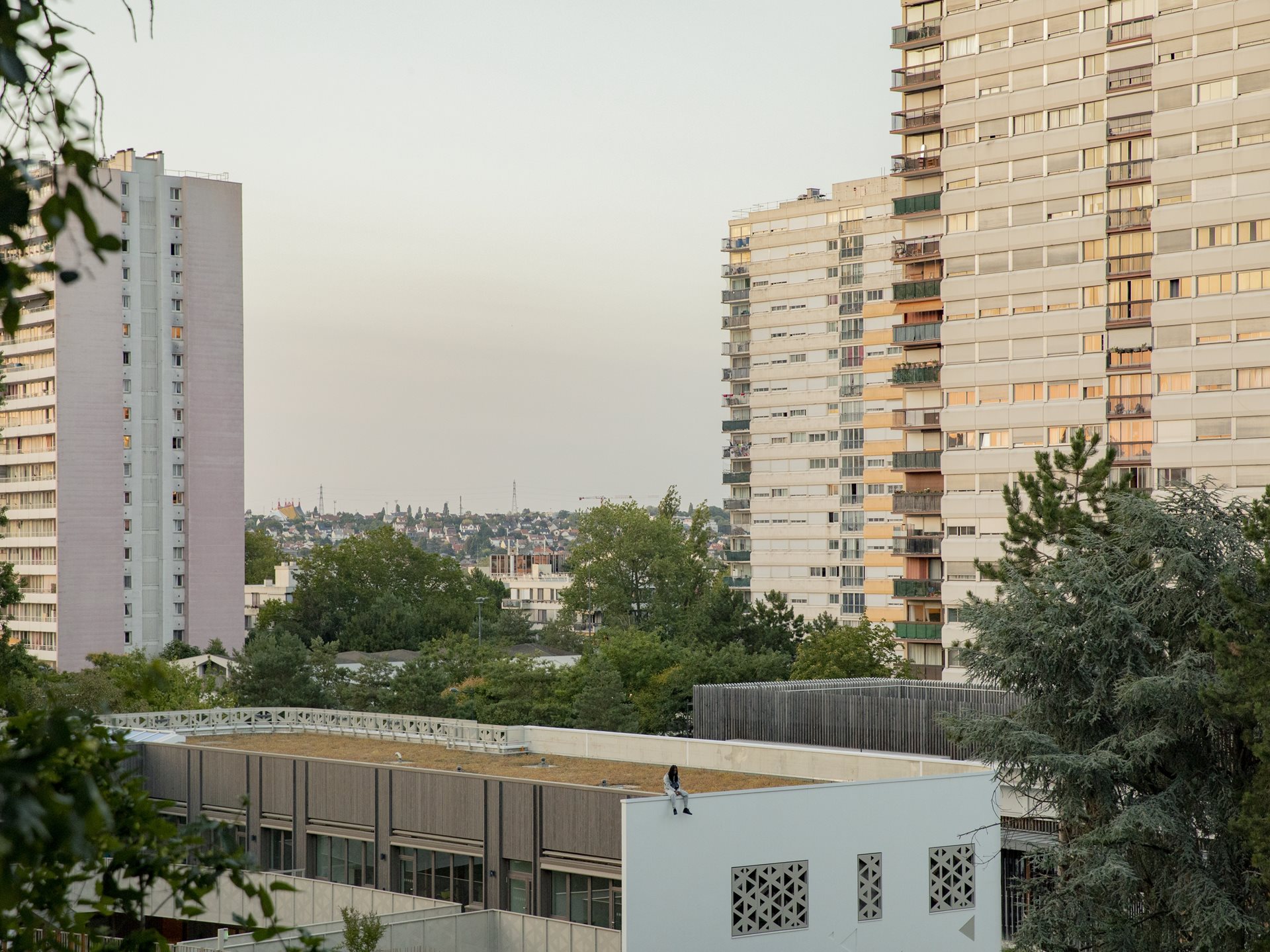 <p>Local resident Ysnear sits on the roof of École élémentaire Paul Langevin in the La Zup housing project. Fontenay-sous-Bois, France</p>
<br />
&nbsp;