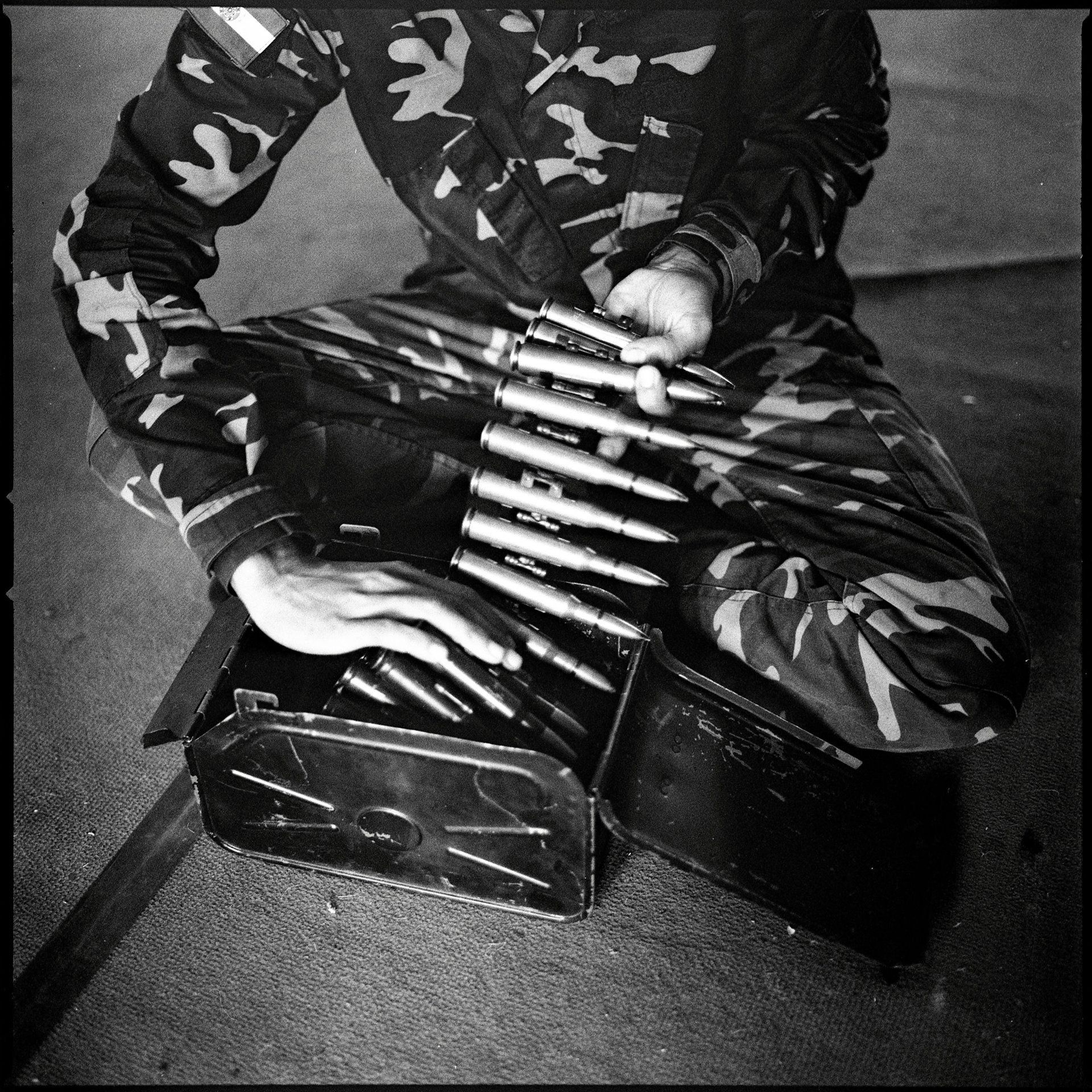 A fighter with the Karenni Nationalities Defense Force (KNDF) prepares for a Myanmar military attack, in Demoso, Kayah (Karenni) State, Myanmar, an area of staunch resistance to military rule.