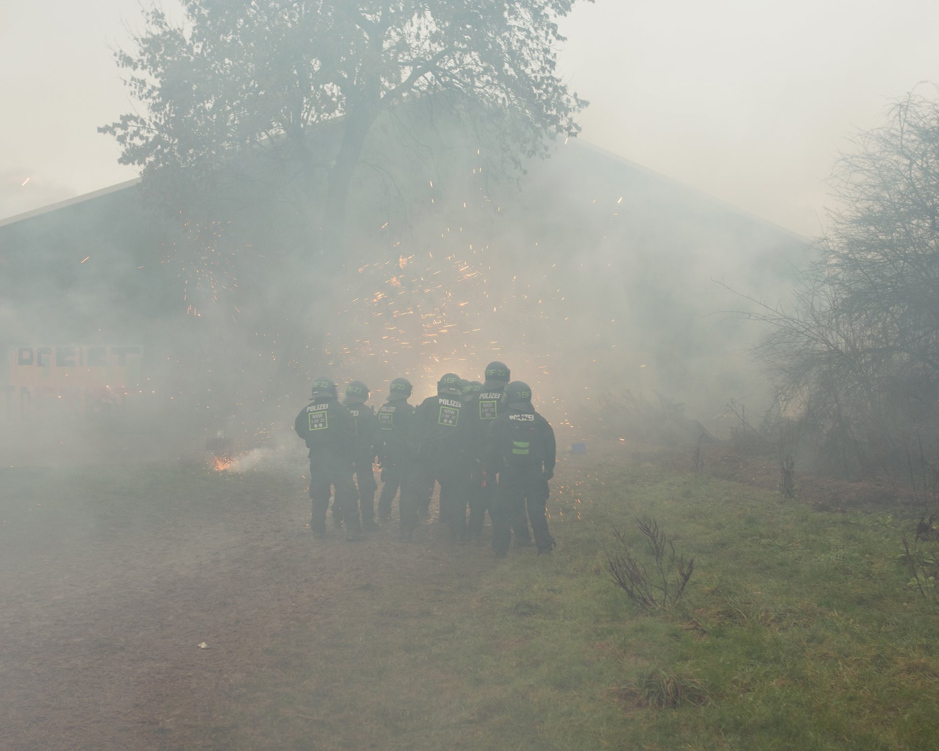 Activists launch fireworks at police carrying out the evacuation of the village of Lützerath, Germany. Police units entered the village from several directions, gaining control within a few hours.