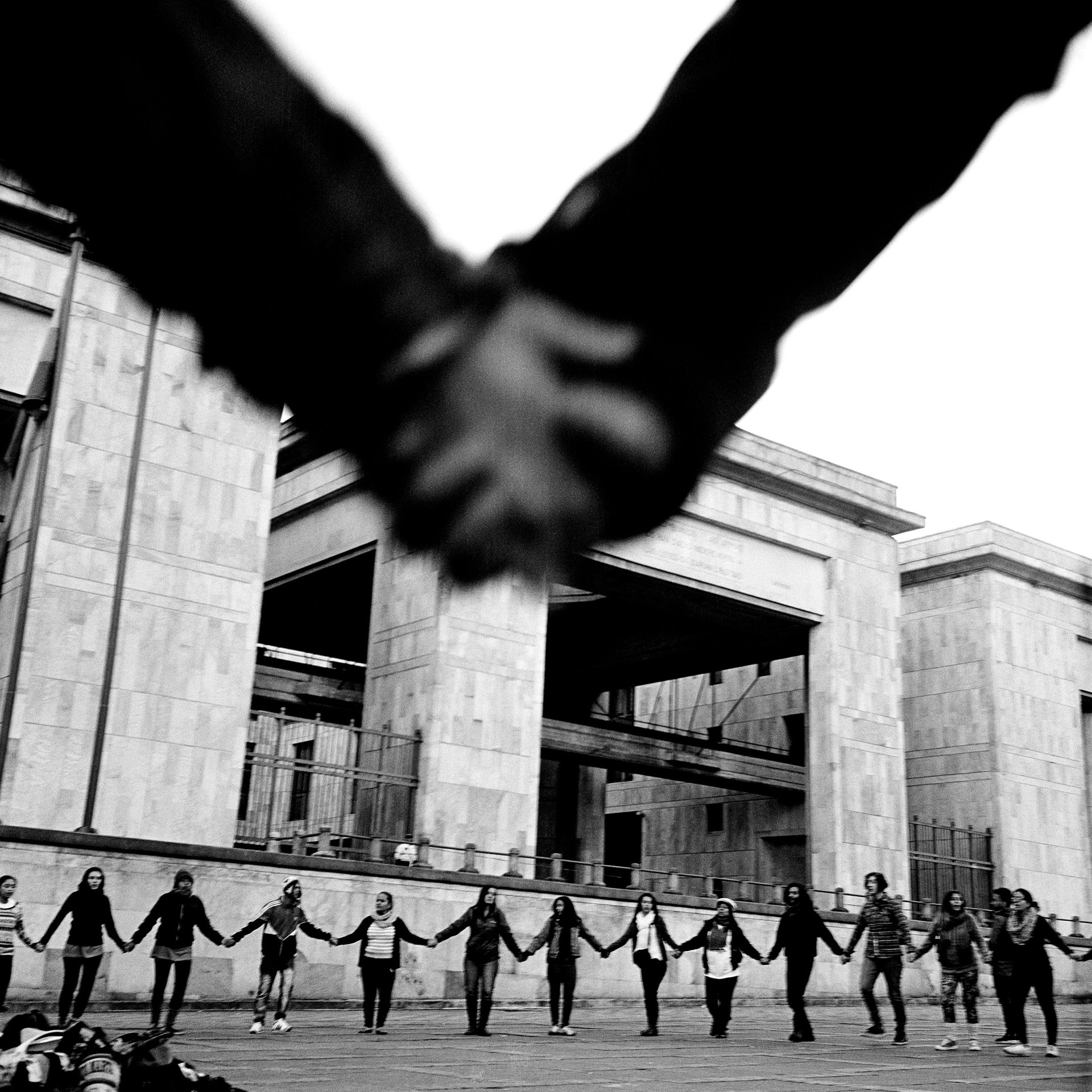 Relatives of the victims of forced disappearance protest in front of the Palace of Justice in Plaza de Bolívar in Bogotá, Colombia. In November 1985, members of &nbsp;the 19th of April Movement (M-19) took over the Palace of Justice in Bogotá, taking hundreds of people hostage, including all 25 of the Supreme Court justices. Security forces stormed and retook the palace, in an operation that left up to 100 people dead, including many justices. Eleven survivors were taken away by security forces and never seen again.