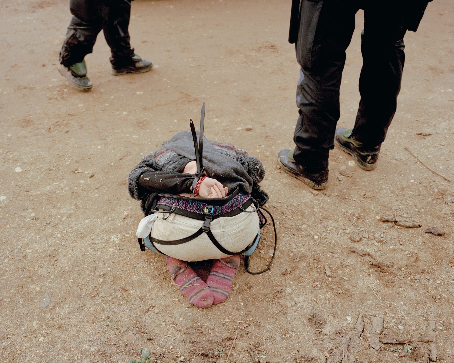An activist kneels on the ground after her arrest during the eviction of treehouses in Hambach Forest, near Kerpen, Germany. Activists had occupied a section of the forest since 2012, building tree-houses to prevent trees being cut down. The police operation to evict them dragged on for weeks, and cost &nbsp;EUR 50 million.&nbsp;