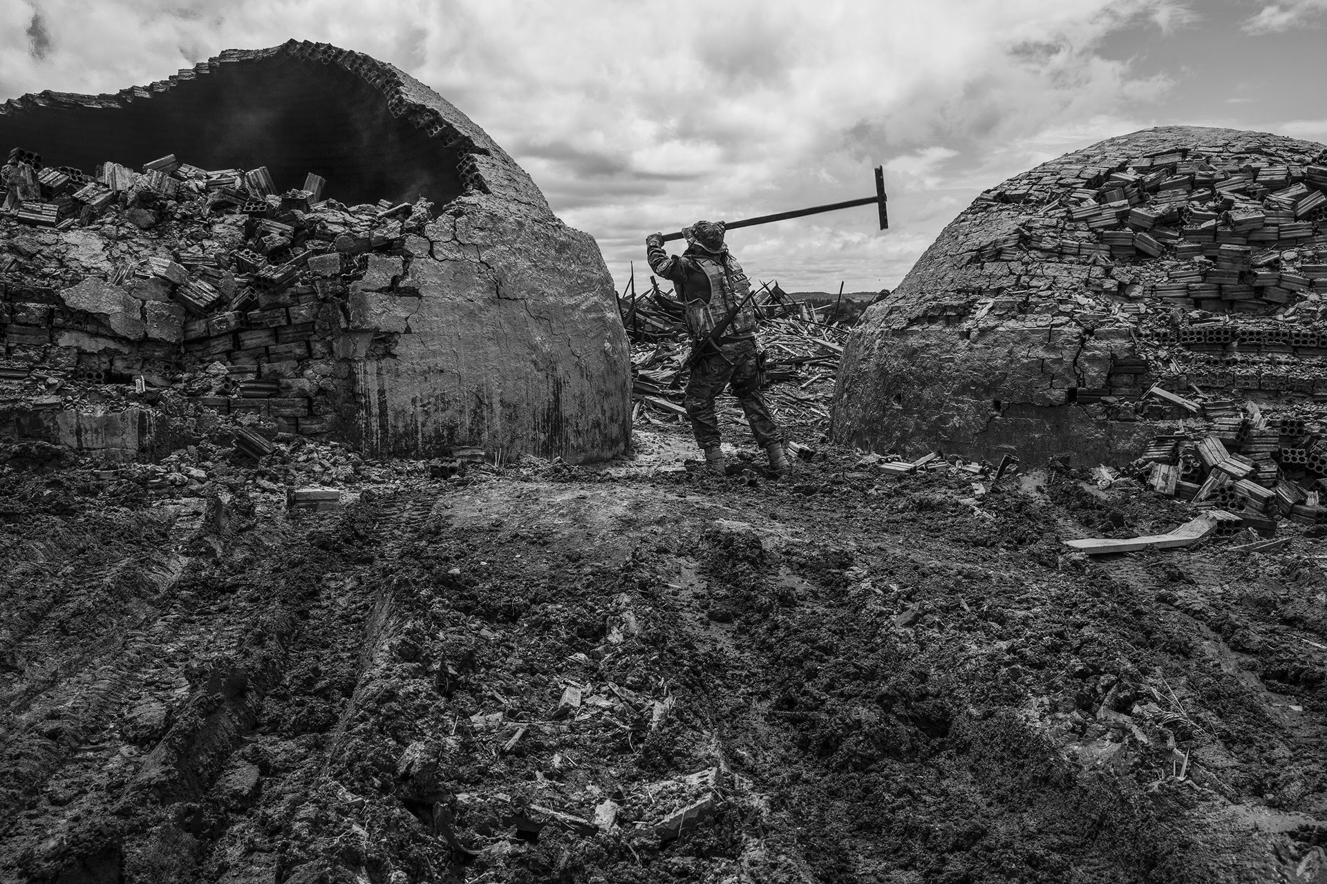 A member of the Specialized Inspection Group (GEF), a part of &nbsp;the Brazilian Institute of the Environment and Renewable Natural Resources (IBAMA), Brazil&#39;s environmental protection agency, destroys brick furnaces that were used to make charcoal at an illegal sawmill. The wood used in the sawmill was extracted illegally from the Alto Turiaçu Indigenous Land.