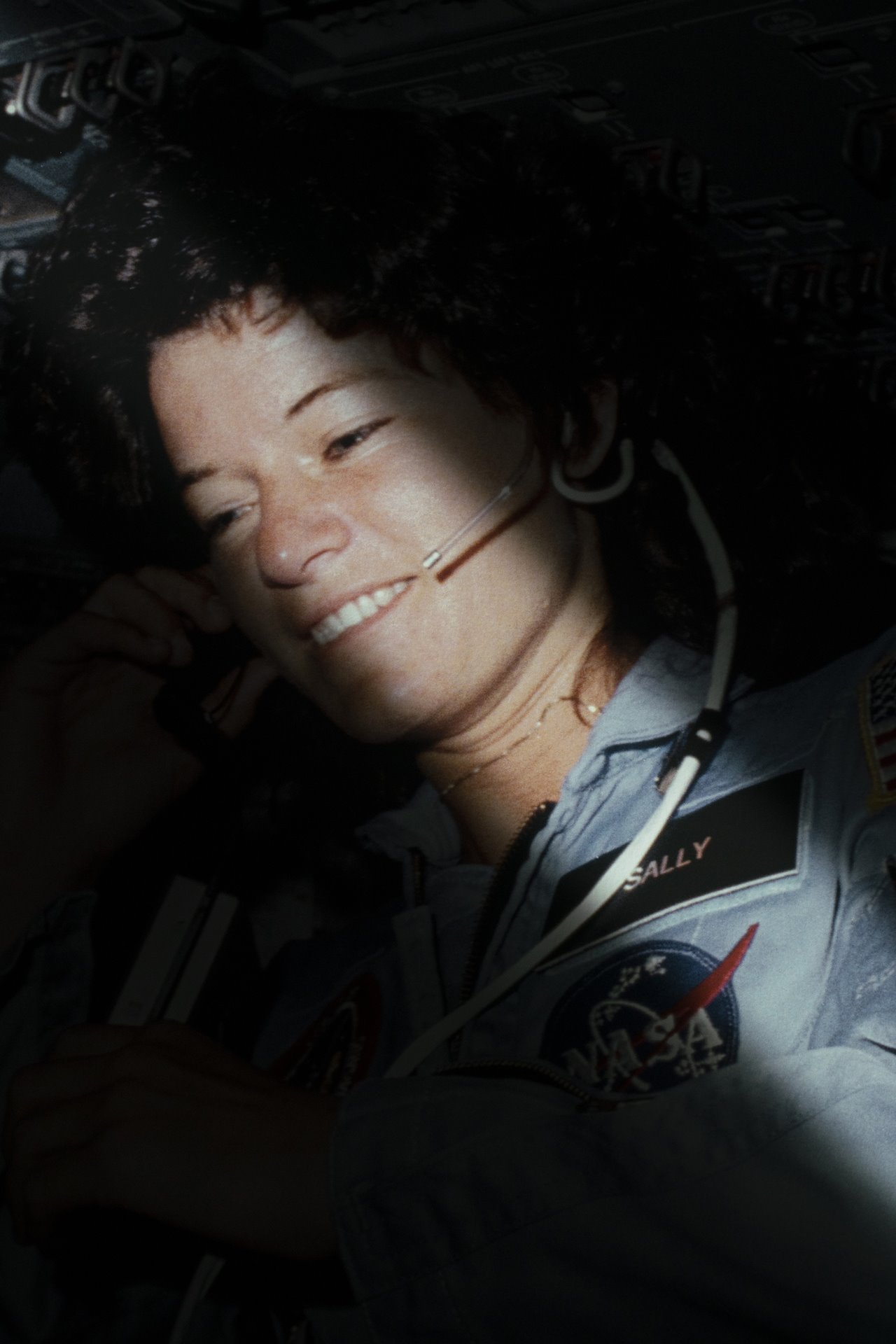 A printed and rephotographed NASA image of Dr. Sally Ride aboard the Space Shuttle Challenger during mission STS-7 in June 1983. In 1983, Dr. Sally Ride became the first American woman in space. Today, she is also recognized as the first known LGBTQI+ astronaut. However, this fact only became public after her death in 2012, when her obituary revealed that Ride was survived by her partner of 27 years, Dr. Tam O&#39;Shaughnessy.