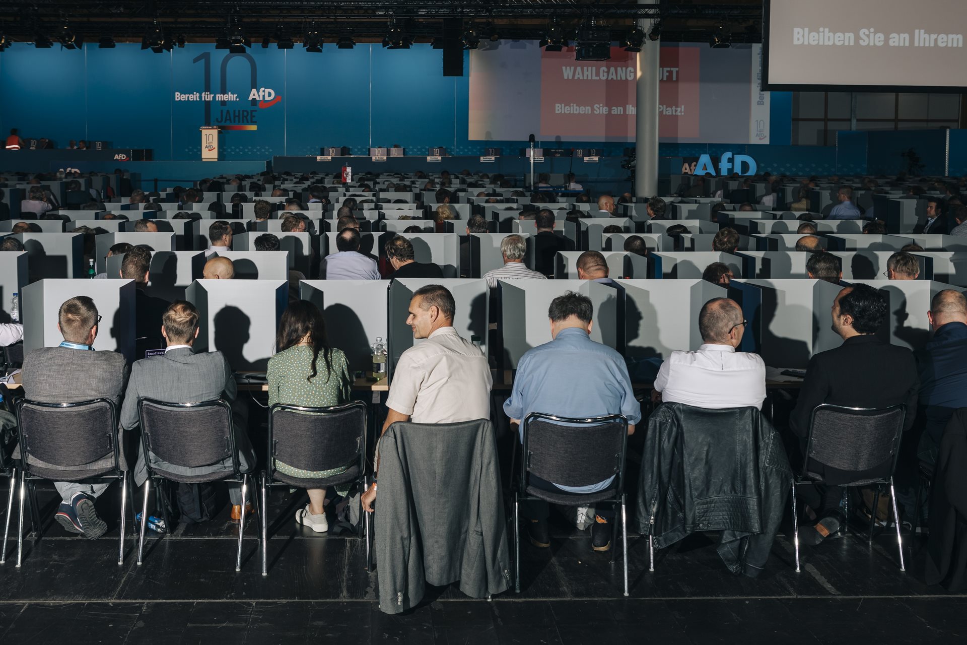 AfD party members cast their votes at a party convention to choose candidates for upcoming European elections, in Magdeburg, Germany.