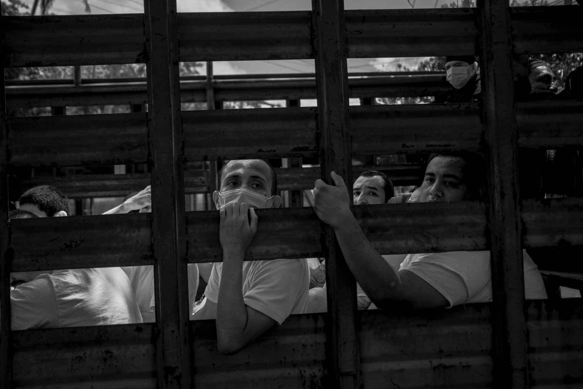 Prisoners at the entrance to Ilopango jail have their last visits with relatives. Once inside, they will be cut off from all communications with the outside world. Ilopango, San Salvador, El Salvador.