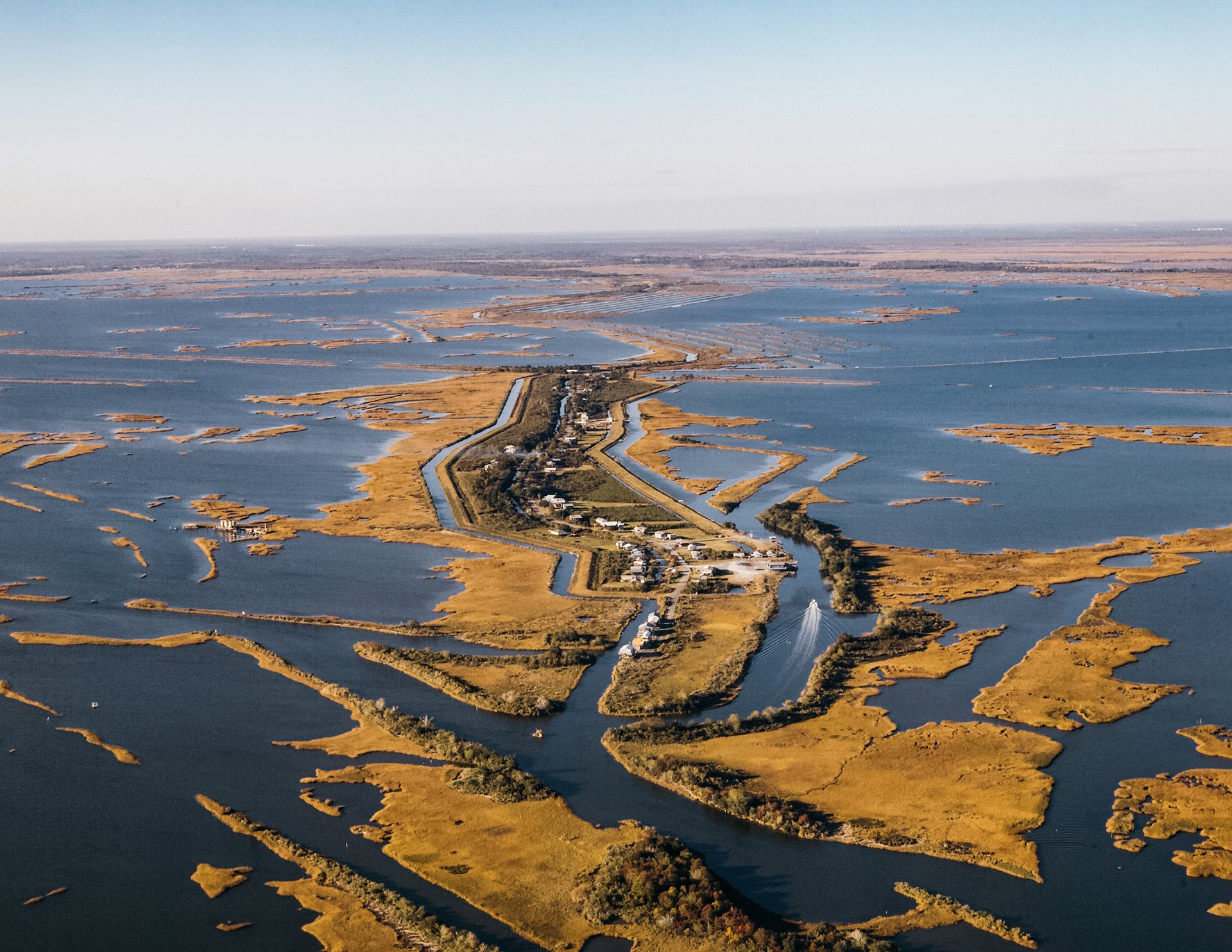 A view of Isle de Jean-Charles in southeastern Louisiana, United States. The island has lost 98% of its surface area since 1955. Today, it is just a thin strip of land surrounded by the water of the bayou.&nbsp;