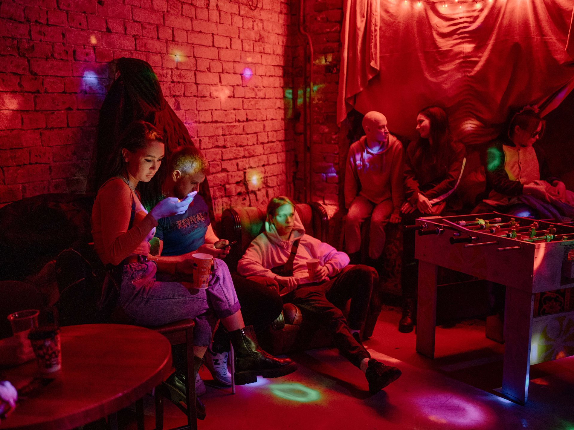 A party at a club in Tomsk, Russia, where DJs played a few tracks in Ukrainian. By 2023, playing Ukrainian music in Russia was perceived as civil disobedience.